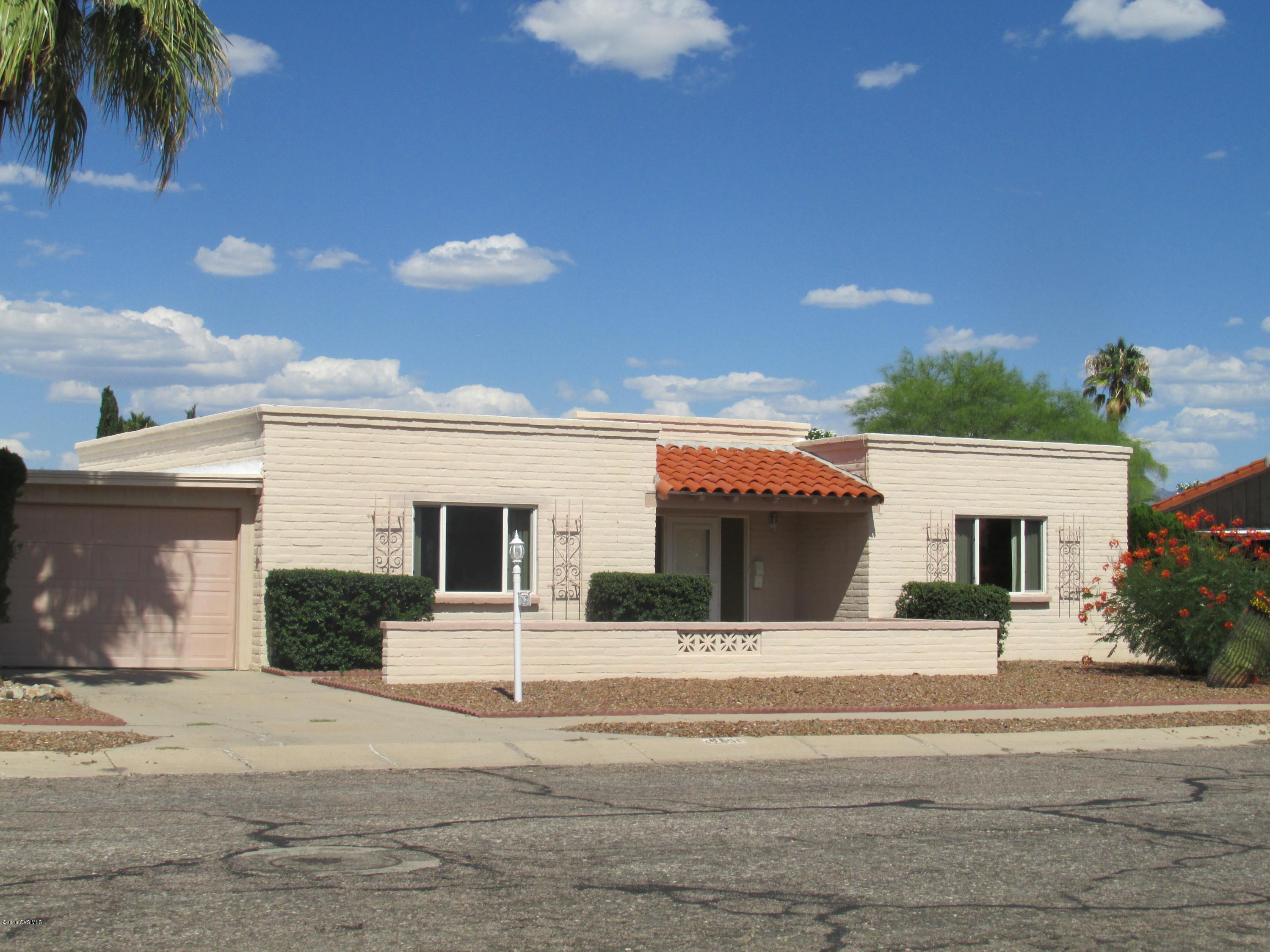 This Home Offers a Large Great Room adjoining Kitchen & AZ Room. New Tile Floors at Entry/Hallway. Kitchen with New Tile Floors, New Faucet, New Garbage Disposal & Newer Refrigerator. Master Bath with Tile Floors, new Faucet, Master Shower has been ReModeled. Guest Bath with Tile Floors, New Faucet, New Paint & ReModeled Tub/Shower Combo. Newer Air Conditioner with New Digital Thermostat. AZ Room with New Portable A/C. Laundry Room has been ReModeled with New Glass Sliding Door & Window and includes a W&D. Mostly all Windows have been replaced. All Electrical Outlets & Switches have been Replaced including new GFCI's. Roof has been repaired and Recoated. 1-Car Carport with Garage Door & Automatic Opener. Termite Warranty Expires 7/29/17. Nice House to enjoy Retirement Years.