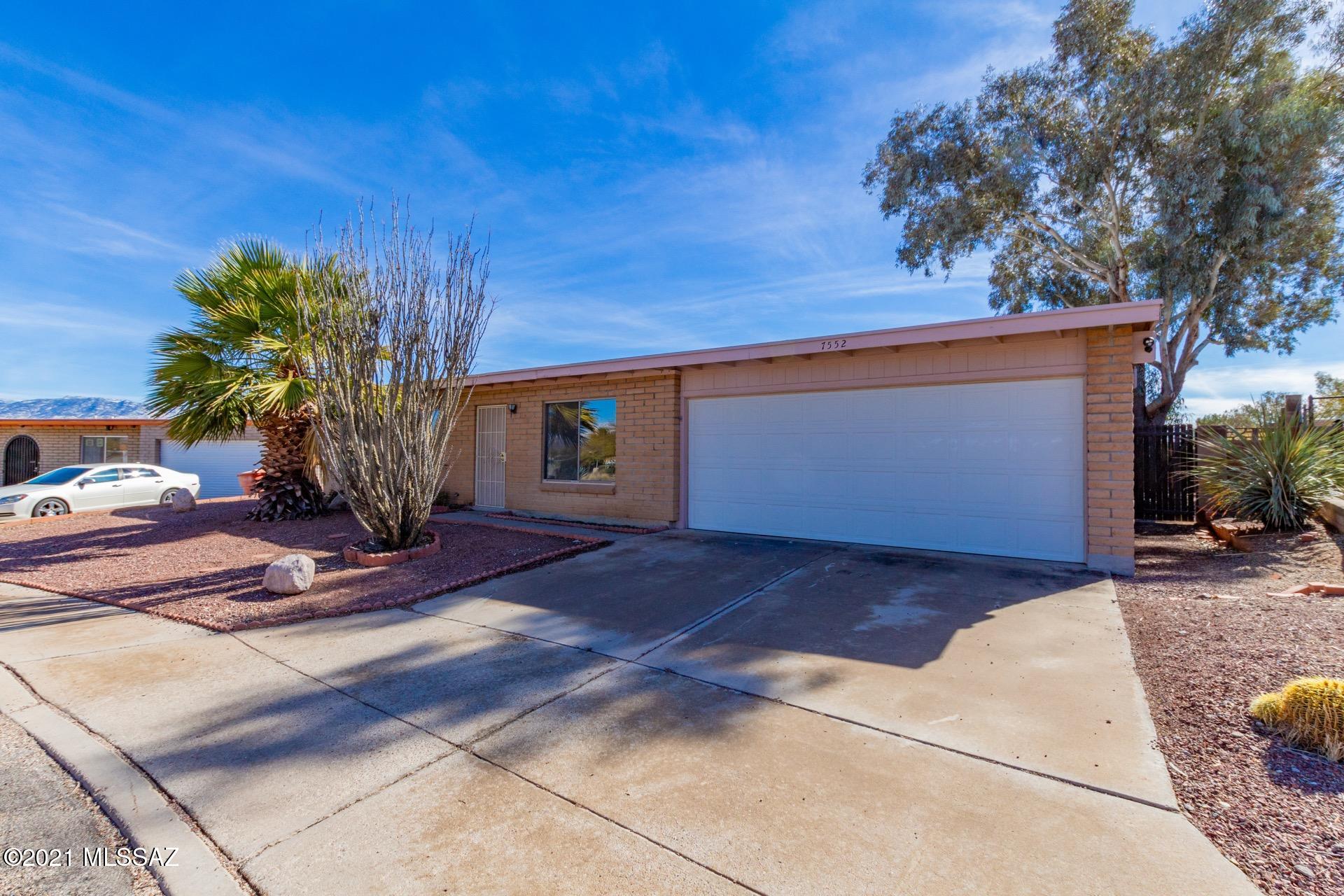 Very charming 3 bed/2 bath brick ranch style home available in east Tucson. Amazing location in a quiet, well established neighborhood with no HOA, conveniently located near shopping and restaurants and within easy reach of downtown. Inside is open and bright with high ceilings, neutral paint tones and soft natural light throughout. Spacious living area flows easily into the eat in kitchen complete with tile flooring, black appliances and a breakfast bar. Bedrooms are generously sized and the master includes a 3/4 ensuite. 2 car garage. Huge backyard is primed and ready for your personal touch. Enjoy breathtaking mountain views from the covered patio. This gem is a must see. Schedule your showing today.