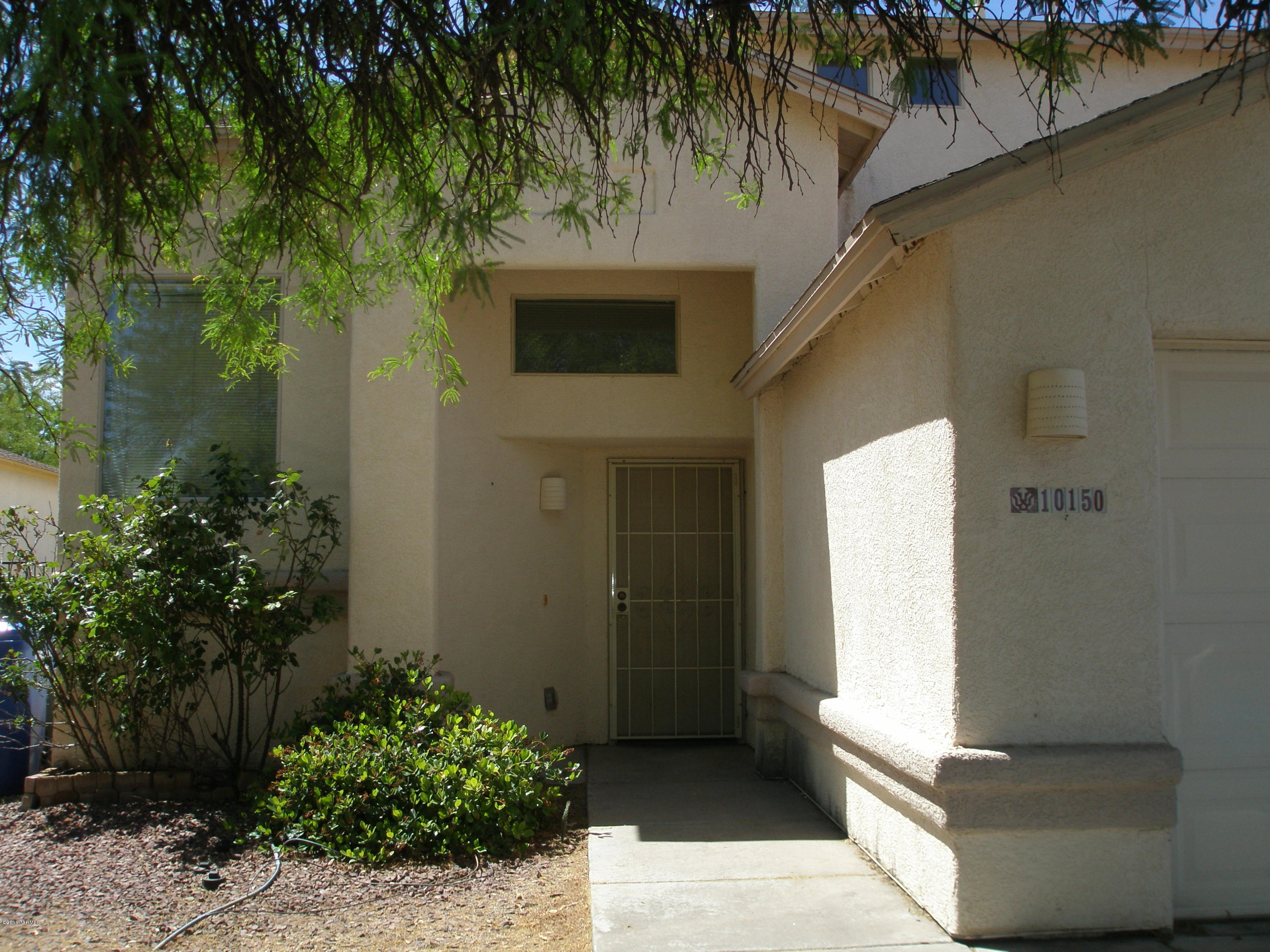 Two-story 3 bedroom, 2 1/2 bath home looking for it's new owner to give it minimal TLC  and make it your home sweet home. Located in the Vail School district, near schools and a park. Home also has an electrical box for a spa.