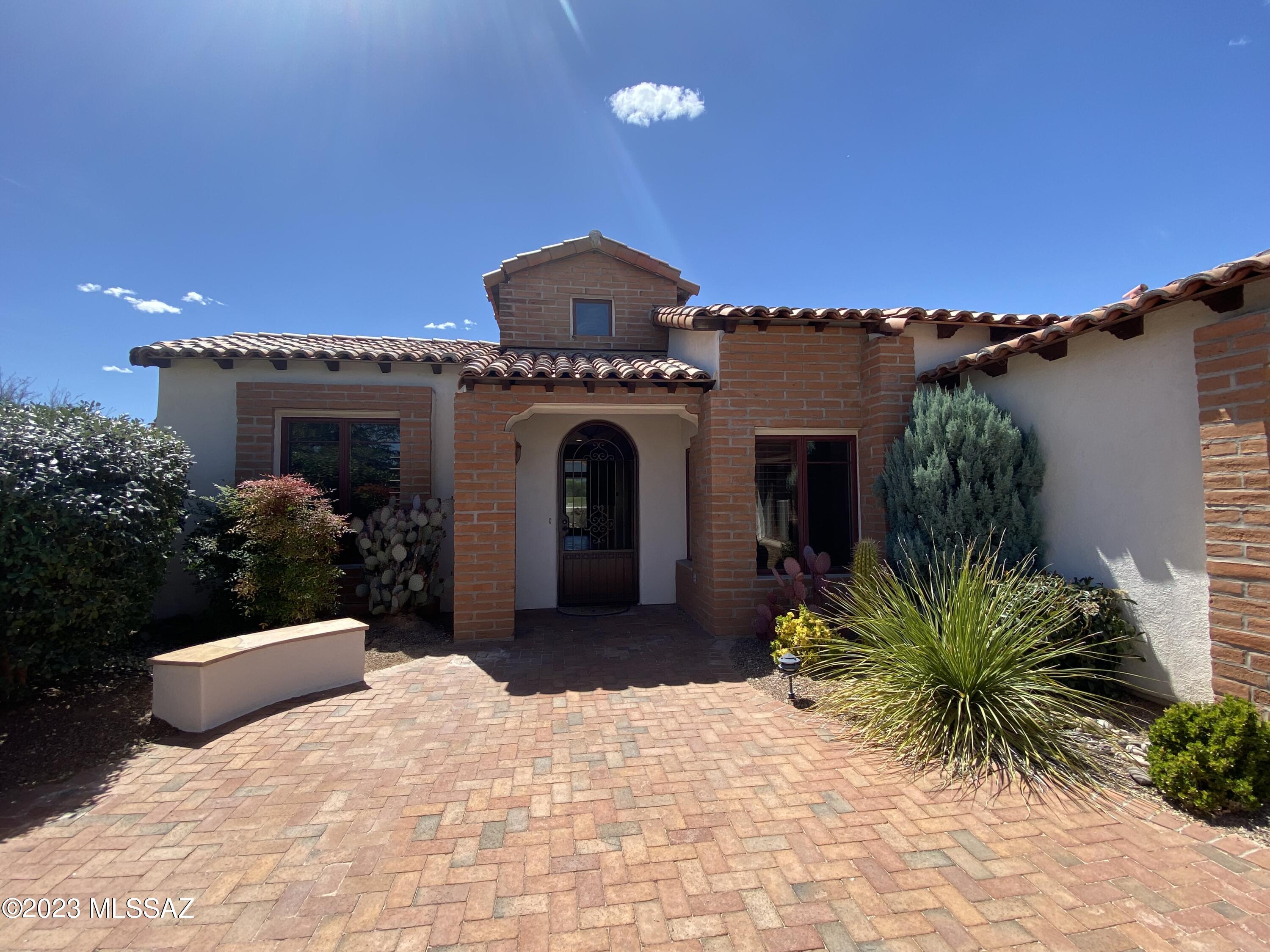 This exquisite luxury Tubac Golf Resort home offers an open, great room floor plan with three bedrooms and three-and-a-half baths, a den, and a two-car garage. A private, gated courtyard in the front faces the 7th fairway of the Anza course and the Santa Rita Mountain Range. The large back patio with fireplace looks across the 6th and 7th fairways of the Otero course toward the Tumacacori Mountain Range.