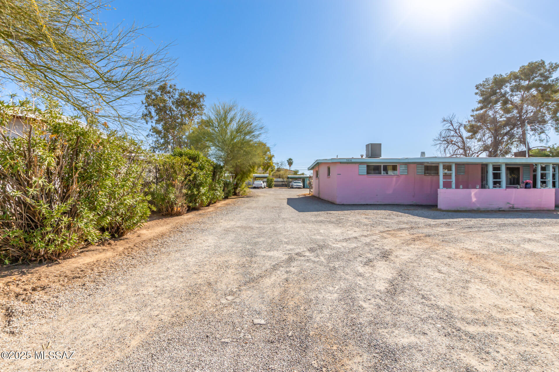 Great investment opportunity! 7 total units consisting of 5 separate houses and 1 duplex  on 2 separate tax codes (parcels) for ease of financing, and must be sold together. There are a total of 16 bedrooms and 8 bathrooms. Each unit has washer and dryer hookups,. fenced yards and tile floors. Most units have HVAC or mini splits (3 new in last year) and some have individual carports. Large private driveway into property adds plenty of parking space, security and privacy. Some rents have been recently increased, but their is more room to increase for current market rates. Square footage, income and lot size are combined total for both properties on the listing. Call listing agent with questions or more information.