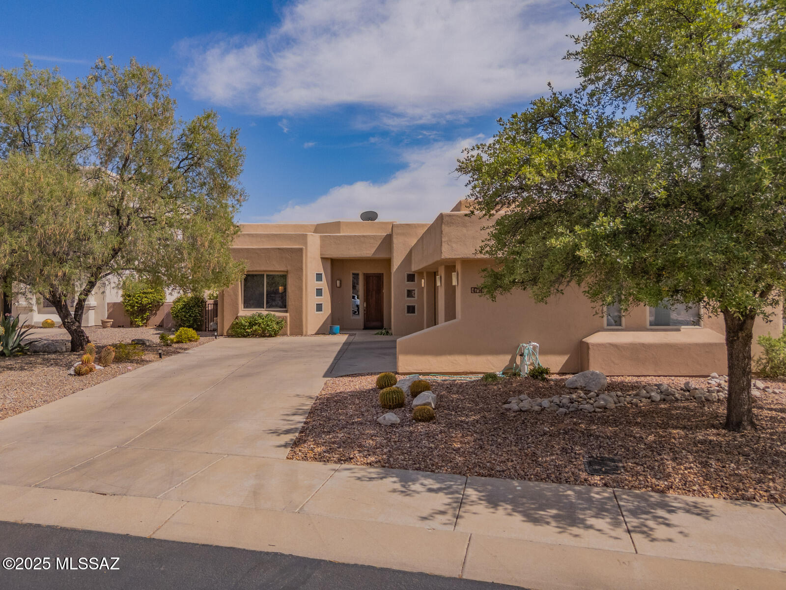 Rare Contemporary Foothills Home situated in pocket gated community of Ventana Del Rio. Designer touches throughout the home create a casual elegance. high ceilings and expansive windows meld together for an open feel.   Contemporary colors add a sophisticated tone.  Features include: Peninsula kitchen finished in granite w/ glass accent backsplash, Large walk in shower in primary bath, Spacious laundry room w/ cabinets and soak sink, 3 car garage, covered patio w/ ceiling fans and solar screens. This home has been well maintained: newer hot water heater, HVAC replaced in 2018 and roof in 2019.  Convenient foothills' location: Close to shopping, Ventana CC, Sabino Canyon Recreation Area, and Restaurants. Postcard views of valley and mountains.