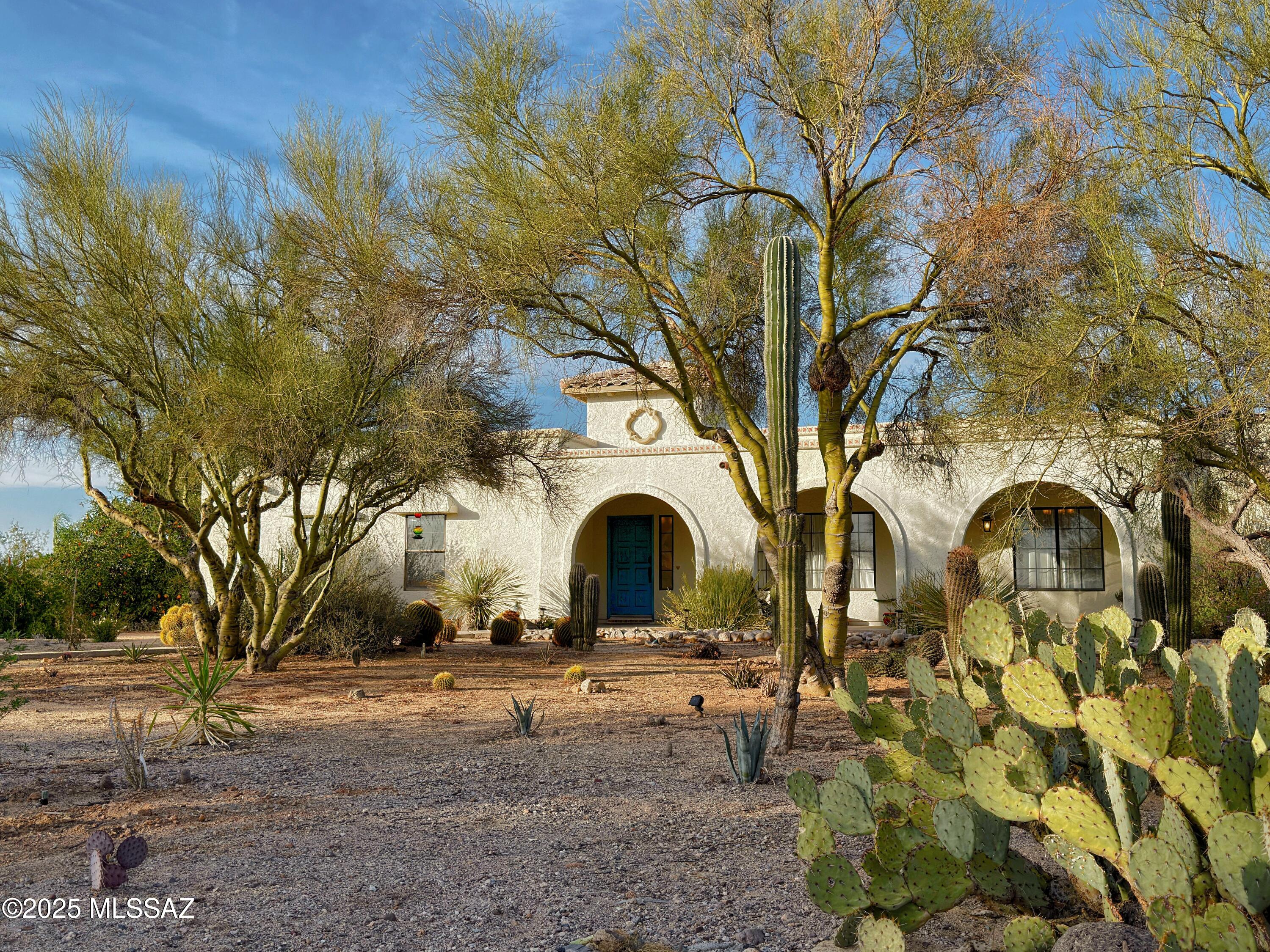 VIEWS! VIEWS! VIEWS! This beautifully updated 4-bedroom, 3-bathroom home is perfectly situated on the corner of a quiet cul-de-sac, offering panoramic views of the Catalina Mountains from the large family room, kitchen, master bedroom, & guest quarters. Designed to maximize these stunning views, the home features a cool, north-facing patio that stretches across the back of the house and overlooks the pool. The formal living and dining rooms are located at the front of the home, set back from the street & surrounded by low-maintenance native shrubs & trees. A circular driveway adds extra privacy, while the master suite includes an ensuite bathroom with a dual vanity, private commode, a large walk-in shower w/ dual shower heads, a walk-in closet, & direct access to the backyard. See More... The 4th bedroom, located on the opposite side of the home, was expanded by 110 SqFt to include a living area, ensuite bathroom, and exterior entranceperfect for guest quarters! Nearly every part of this home has been updated, including a stunning remodeled kitchen with high-end Monogram Energy Star Appliances, new cabinetry, lighting, sink, quart countertops, and stunning counter to ceiling tile backsplash. Additional updates include fully remodeled bathrooms, a remodeled laundry room, a whole-house water filtration system, freshly painted interiors and exteriors, a wall-enclosed gas fireplace with decorative lighting, new skylights, new doors, and a new pool pump for the upgraded saltwater pool. The home also boasts two covered patios, mature fruit trees such as tangelo, pomegranate, and variegated lemon trees, and a master suite that opens to its own private back patio with breathtaking mountain views. Built in 1989 and completely remodeled to near-new condition, this home has been tastefully decorated with a nod to the owners' deep love of the magical kingdom, earning it the nickname "The Disney Home".  This is a must-see property you won't want to miss!  Please see the documents tab (Seller Disclosure & Attachments) to see a more detailed description of all the upgrades, amenities & remodels these sellers have completed.