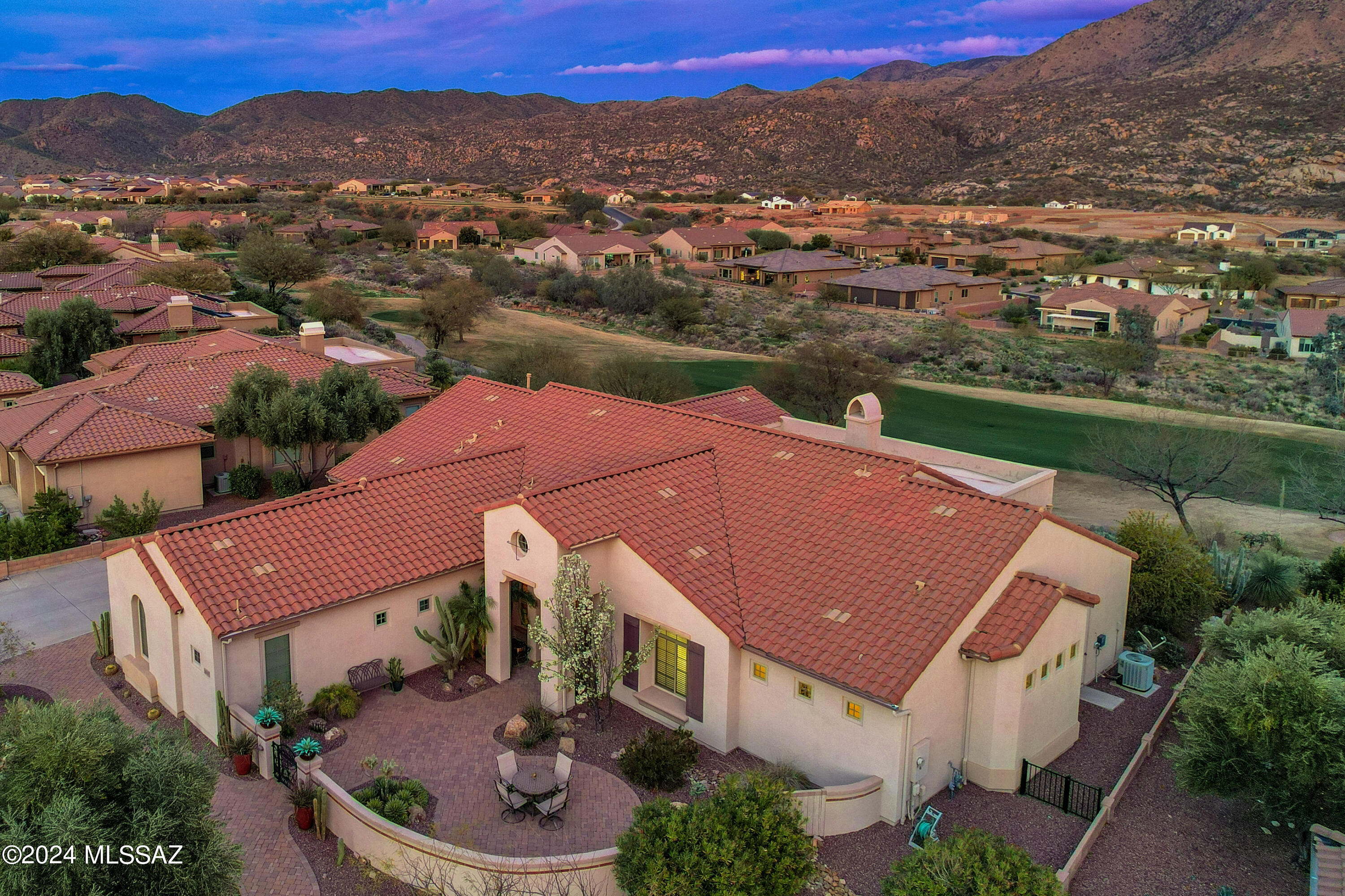 Welcome to luxury living at its finest! This stunning Tierra model home offers an unparalleled lifestyle on the 5th fairway of Welcome to luxury living at its finest! This stunning Tierra model home offers an unparalleled lifestyle on the 5th fairway of The Preserve golf course, with sweeping views of the Catalina Mountains. The large great room is a focal point, featuring a cozy fireplace, a spacious dining area, an island bar, and a new stainless-steel appliances, granite countertops, and a generous pantry. The Master suite is a true retreat, boasting a massive en-suite bathroom with separate dual sinks, a vanity, and a double walk-in shower. The indulgence continues with not one but two walk-in closets, providing ample his-and-her storage space. The thoughtfully designed split floor plan includes two guest suites, each  with private vanities and a Jack & Jill  soaking tub/shower. Luxury is evident in every detail making  this home an oasis of comfort and style. With only one owner this residence has been meticulously maintained, ensuring its pristine condition. Enjoy the beauty of sunrises/sunsets from your own backyard, creating  lasting memories in this exceptional home. Don't miss the opportunity to experience the epitome of luxury living. Schedule a showing today and make this magnificent property yours!