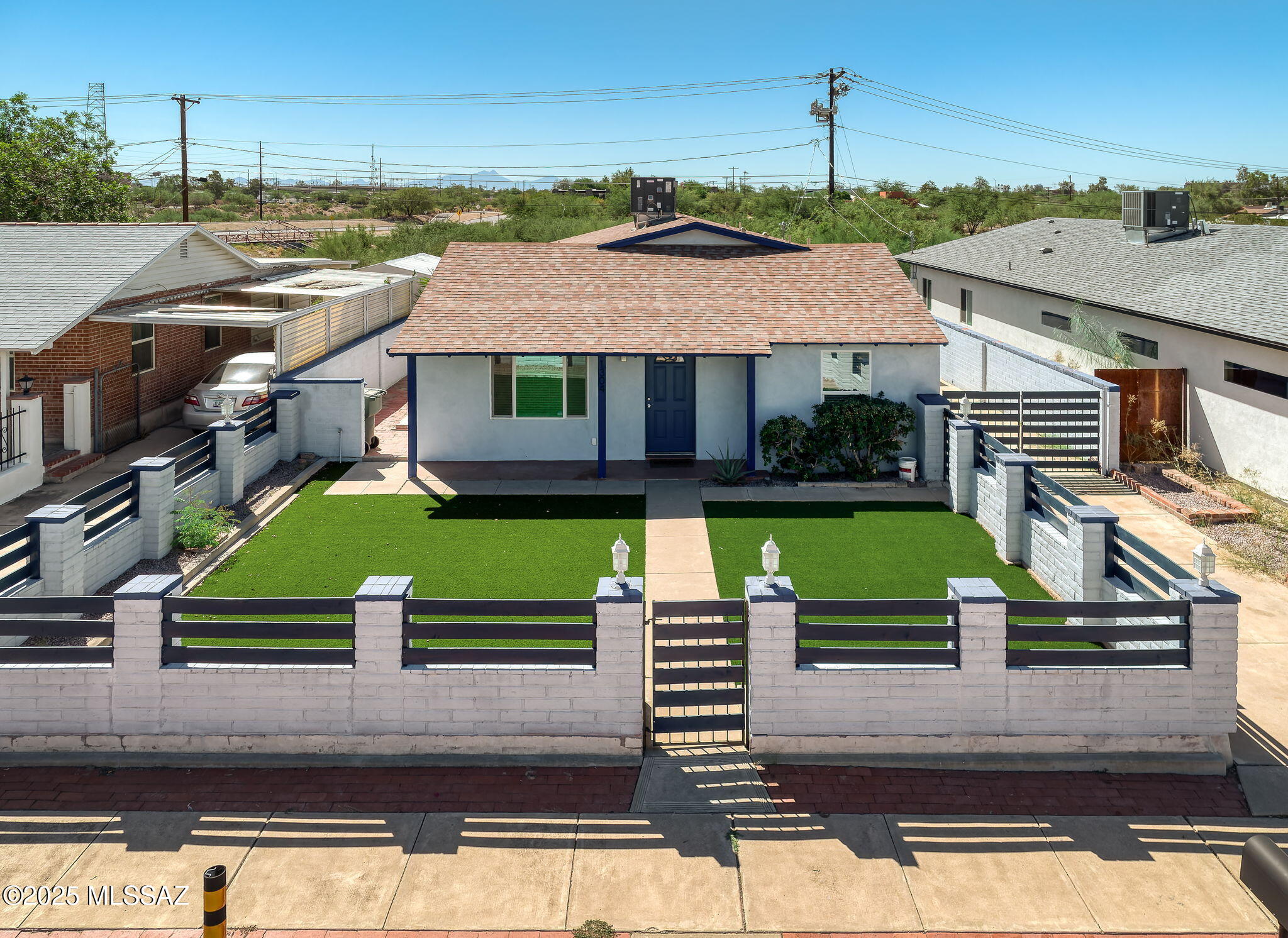 Welcome to 1304 E 13th Street, a beautifully remodeled 5-bedroom, 3-bath home located in the heart of central Tucson. This spacious residence offers approximately 2,138 square feet of living space on a 5,500-square-foot lot, perfectly blending modern comfort with timeless charm. The open-concept layout features a bright living area and a contemporary kitchen with a generous island, quartz countertops, and stainless steel appliances. The primary suite includes a private bath and walk-in closet, providing a relaxing retreat. Recent updates include stylish flooring, modern fixtures, and energy-efficient systems throughout. The home's design offers a seamless flow between indoor and outdoor living, with easy access to a large, enclosed yard—ideal for entertaining, pets, or quiet relaxation. A gated driveway and fenced front yard add both privacy and curb appeal.

Located just minutes from the University of Arizona, downtown Tucson, and an array of restaurants, shopping, and public transit options, this home offers exceptional convenience and flexibility. With five bedrooms and three full bathrooms, it's ideal for families, students, or investors seeking rental potential near the university area. Move-in ready and meticulously updated, 1304 E 13th Street captures the best of central Tucson living.

Fantastic investment opportunity, Great rental property; was being leased by Owner for $3,400 - $3,550 per month.