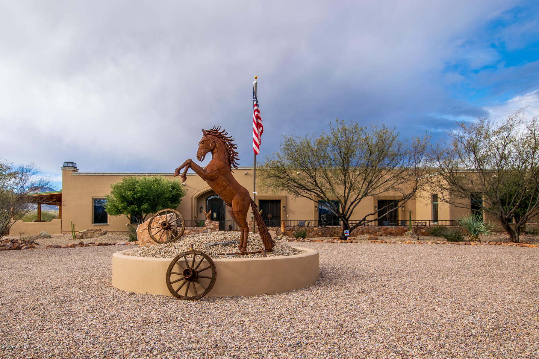 Exceptional, outstanding, exceeding the standards of even your most discriminating clients; these are terms that describe this beautifully designed and well appointed 3 bedroom, 3.5 bath, 3596 square foot home situated on 5+ acres in Tubac! This home also has a separate 900+ square foot guest casita with 2 bedrooms & 1 bathroom a 2 car garage and an RV garage totaling approximately 2000 sq/ft. Totaling over 4500 square feet of living space with 5 bedrooms and 4.5 baths, there is plenty of space for friends and family to visit. The entire property is fully enclosed with rusted steel fencing to insure privacy. In addition there are walking paths throughout the well groomed property which provide an excellent place for late afternoon or early evening walks with each other or your favorite pet
