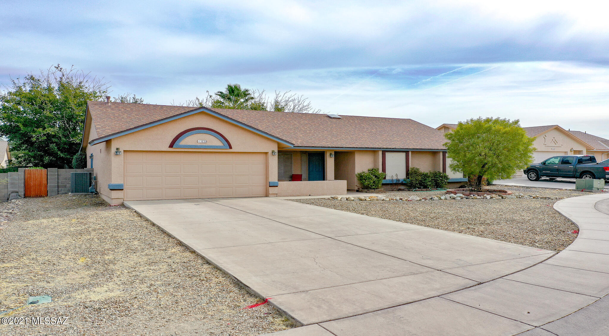 Check out this beautiful, spacious home in Quail Ridge! Large bedrooms, loads of closet space, and a kitchen with counter top space galore! Family room features a wood burning fireplace for those chilly winter evenings. New Lennox HVAC system was installed in June of 2020, New roof installed, and all new exterior paint in January of 2018, and new interior paint within the past couple of months. If you enjoy patio sitting, the front and back patios are just perfect for relaxing! There is a separate fenced off space for either a dog run or a gardening area, and the rest of the yard has low maintenance gravel landscaping and trees! For hanging lights and decorations around the exterior, there are outlets to make it convenient! All of this located in a quiet cul de sac, convenient to schools,