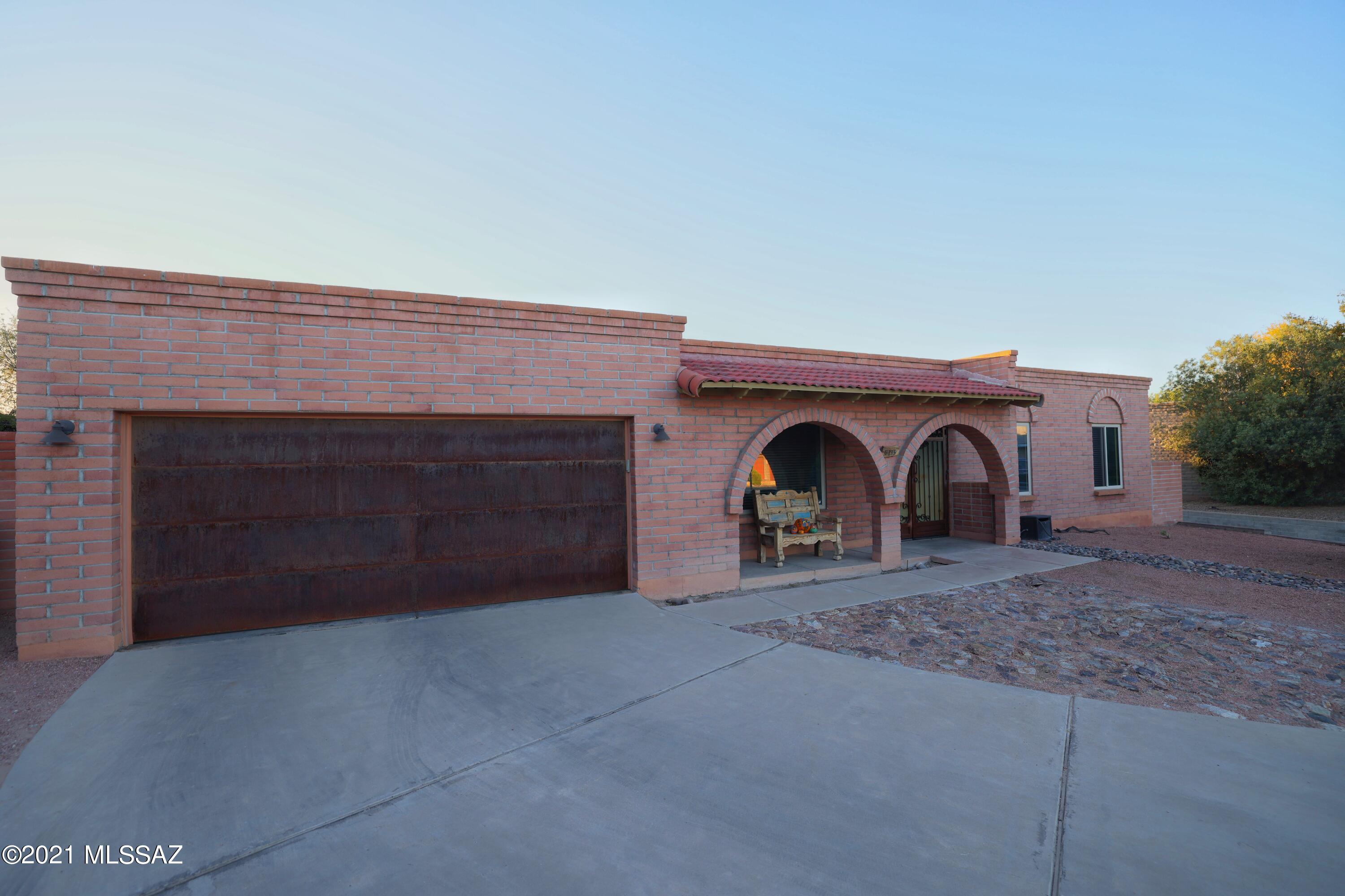Beautiful home tucked away in a cul-de-sac on the east side of Tucson.This 4 bedroom 2 bathroom home is what you have been looking for. Diagonal tile throughout the home. Remodeled kitchen with breakfast bar and informal dining area by a bay window. Spacious primary bedroom with a large walk in closet and access to the back yard. Step down into a separate living room large enough for entertaining your guests. Bedroom by the kitchen has plenty of closet space and could be used as guest bedroom or home office. Step outside into a gorgeous back yard with green turf, sparkling pool and hot tub. It's a little oasis in the desert and it will not last! Schedule a showing today!