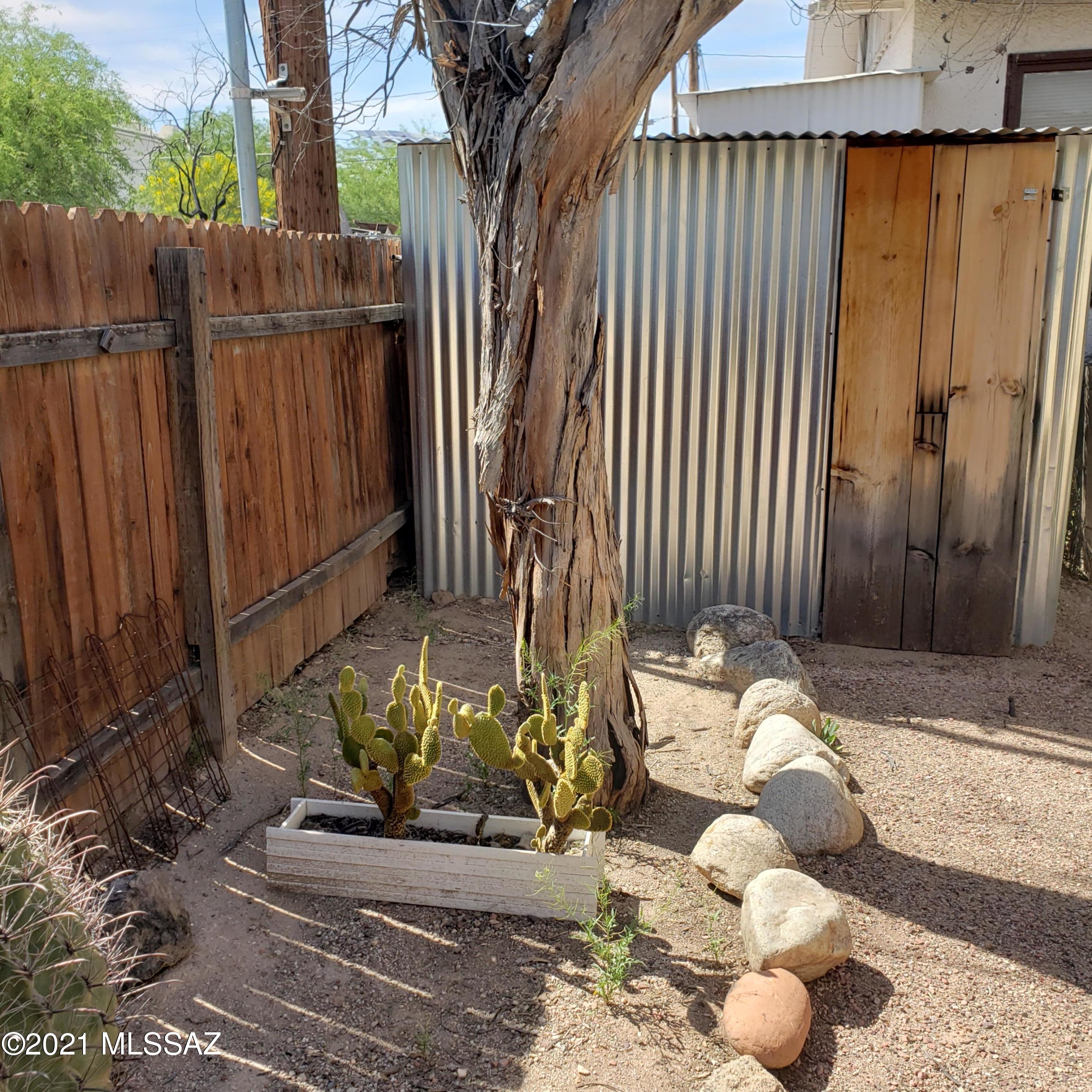 LOCATION!  1bdr/1ba guest house with charming touches PLUS all essential utilities included! Guest house sits behind main house with its own private entrance and private fenced yard with storage shed. Call today! 520-544-2727 Tenant occupied through 7/31/2021