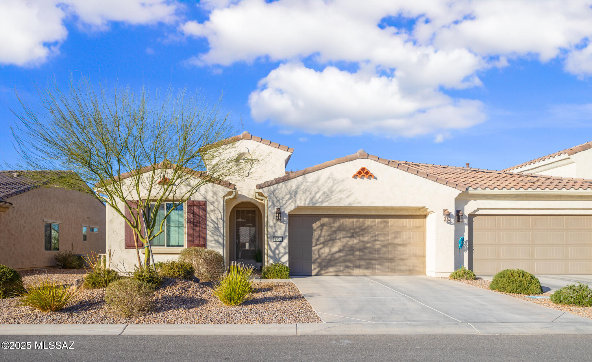 This stunning Villa has been upgraded with modern enhancements throughout, beginning with a beautiful custom wrought iron door. 

The kitchen has upgraded appliances, quartz countertops, a stylish backsplash, and elegant pendant lights. Practical features include under-cabinet lighting, built-in charging ports, and sliding shelves for easy access and organization. 

The primary bedroom has been enhanced with additional outlets and built-in USB ports for modern convenience. The primary bathroom offers a spa-like experience with a beautifully tiled shower, a rain glass enclosure, a built-in tile seat, and a shelf with a handle for ease of use. The second bedroom is pre-wired for a ceiling fan with ceiling support. Additional upgrades include luxury vinyl plank (LVP) flooring in the main living areas, plush upgraded carpet and padding in both bedrooms, and premium Hunter Douglas window coverings for style and energy efficiency. With its thoughtful upgrades and stylish finishes. Outdoor patio has beautiful brick pavers and mountain views.  This villa is ready to be your perfect home. 

 Plus, with the Homeowners Association (HOA) covering landscaping, termite control, roof maintenance, a gated community entrance, and a blanket insurance policy, you can enjoy a low-maintenance lifestyle with added peace of mind while you are enjoying all Quail Creek amenities!
