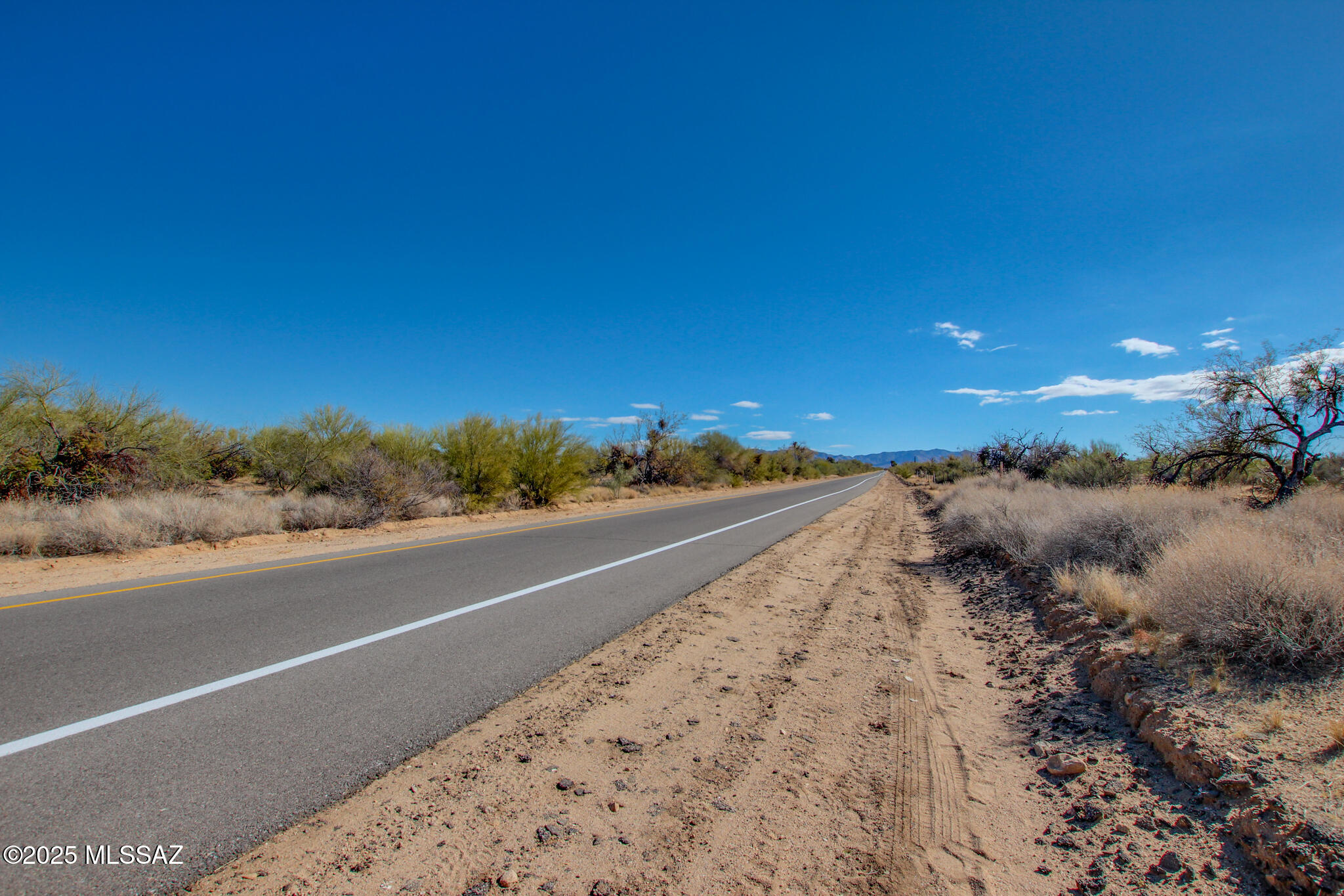 Build your dream home or ranch on this stunning 1.14-acre lot in Tucson! Discover the perfect blend of rural living and convenience with this spacious property, located just a short drive from Highway 86. Boasting 1.14 acres, this lot offers breathtaking views of Kitt Peak and the serene beauty of the desert. The lot is ready for your vision with water, electric, and gas available at the lot line, while a septic system will be required. With horse privileges and plenty of room to create your ideal home or ranch, this property is perfect for those seeking a peaceful lifestyle with modern accessibility. Don't miss this incredible opportunity to own a piece of the desert paradise.