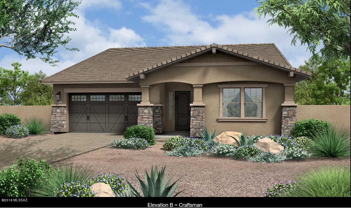 PURCHASE THIS HOME BY MAY 15, 2018 & CLOSE ESCROW BY JUNE 29, 2018 TO RECEIVE A GE STAINLESS STEEL REFRIGERATOR AND GE FRONT LOAD WASHER & DRYER! This gorgeous single story home is located in The Cove at Center Pointe Vistoso, a gated community within Rancho Vistoso and features a Gourmet Kitchen with Gas Cooktop, Double Ovens, Granite Kitchen Counter top, Custom Tile Kitchen Back splash, LED Light Tape under some Upper Kitchen Cabinets LED Light tape,  Exterior French Door at Master Bedroom, Tile to Ceiling Frameless Walk-In Shower at Master Bath, Raised Vanities at Baths, 12' Center Pull Slider in Great Room, Double French Doors @ Den, 2nd Sink at Bath #2, Soft Water Loop, Gas line to Dryer & Patio for future use, Upgraded Flooring, Community Pool, Ramadas, Walking Trails and much more!