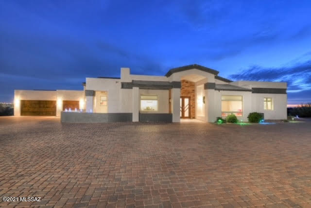 Location, Location, Location. This incredible foothills home sits on almost 3 acres of land with amazing views. The home is just under 5000 sq. ft. The great room has soaring ceilings and a beautiful gas fireplace with a granite surround.  The gourmet kitchen consists of Viking stainless steel appliances:  Gas Range, Hood, Built in refrigerator, double ovens, dishwasher, a pantry to dream for and an incredible granite Island.  Undermount sink, reverse osmosis and water purifier, custom cabinetry, and a granite backsplash. Eat in Kitchen with a fireplace, breakfast bar and access to a private patio for outdoor dining. Oversized double Glass doors open to an immense patio, fabulous pool with lap lane (Removable child safe fence), an inviting grassy area, and even a basketball court. Two master bedroom suites. One with a separate sitting area and an attached office w/ fireplace. Every bedroom has its own bathroom. The den has double doors and opens to the great room. Very large 3 car garage with extra storage space. Owned solar system will save thousands of $$$ a year on Electric bills. New Windows, New roof, 2 newer Trane HVAC systems with allergy filtration. District 16 schools. Close to upscale shopping, luxury resorts, golf, hiking, hospitals and great restaurants.