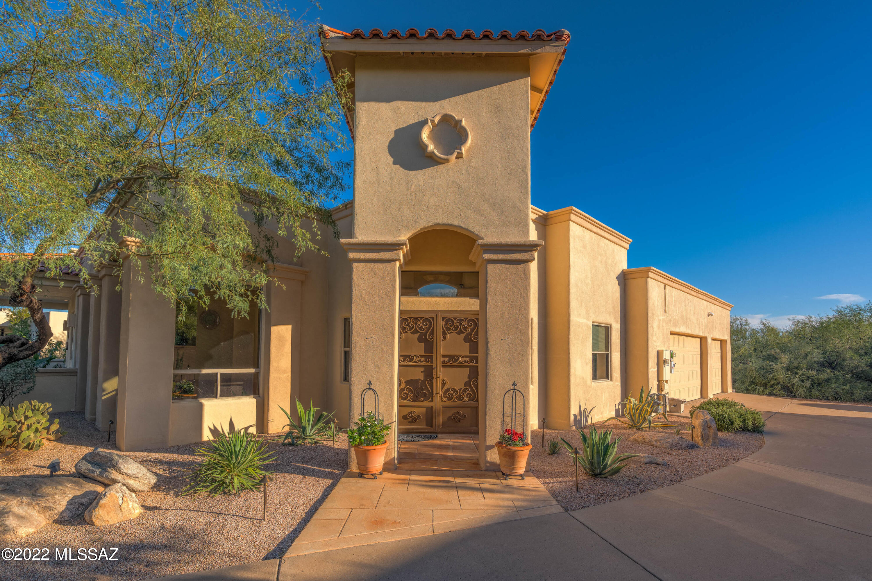 VIEWS VIEWS VIEWS! Stunning mountain views from this beautiful custom home, built for a luxurious and private lifestyle. Magnificent newer pool and spa area with a spacious patio, waterfalls, and gas fireplace. The elegant floor plan is bright and spacious with high ceilings, wide hallways, large picture windows, sky lights, tile flooring and a beautiful fireplace. The gourmet kitchen is designed for a connoisseur with endless amounts of counter space, cabinetry and TWO enormous pantries. Large OWNED Solar System on the roof, newer AC and hot water, plus new appliances, extensive night lighting.  Featuring 4 bedrooms (3+office), 3-baths, 3005 sqft, plus a huge 3-car garage with storage. Nestled in the prestigious community of Winchester Ranch, and just minutes from the base of Mt. Lemmon.