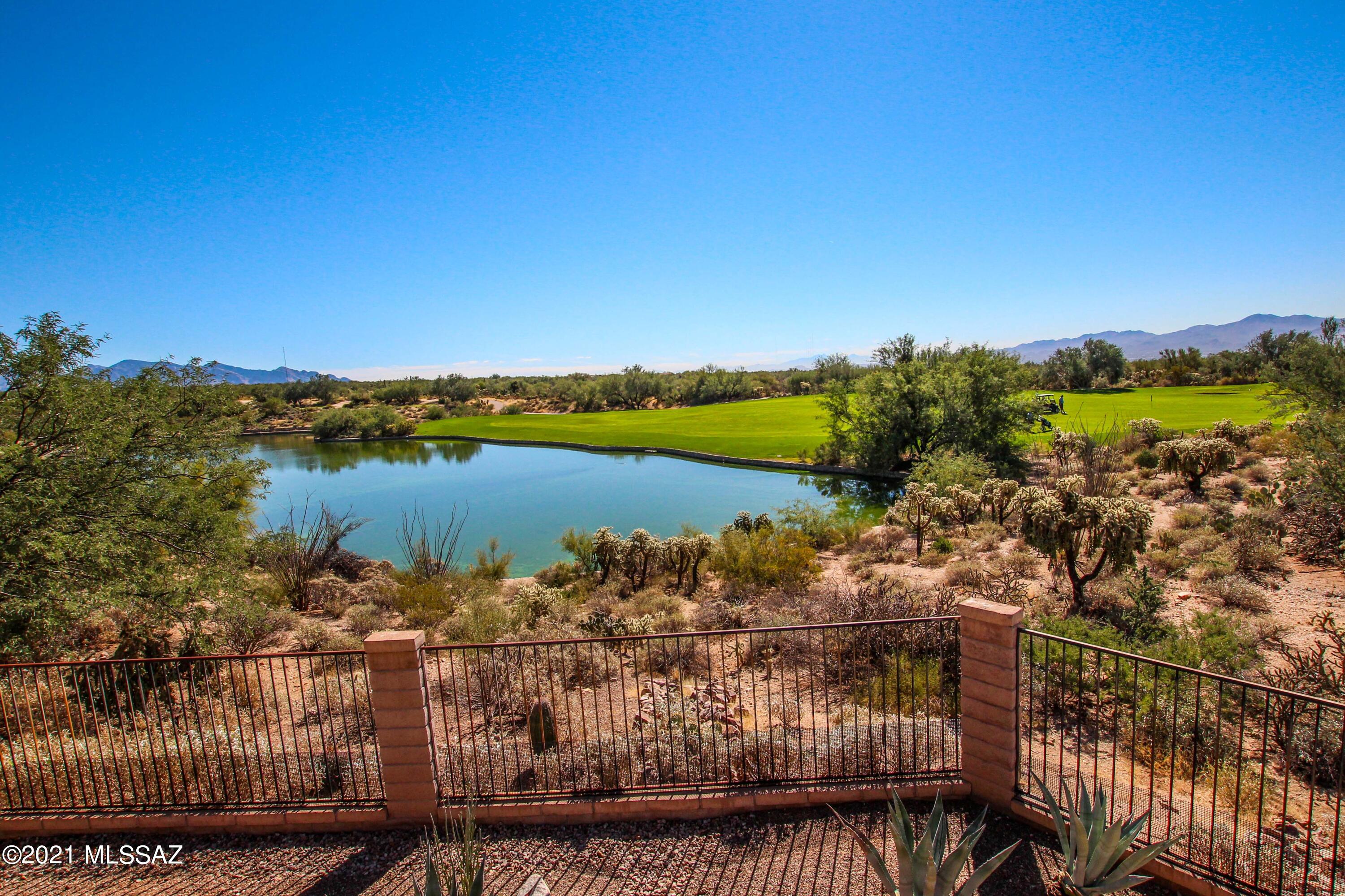 Breathtaking 3 bedroom 2.5 bathroom single story Santa Fe style home located in the Dos Lagos at Dove Mountain subdivision. You will find that the backyard has amazing views of the golf course. Covered patio with fan to enjoy the views on a hot summer day.  Attached is a three car garage. Highly desired gated community and is in a Cul-de-sac for extra privacy. Spacious open floor plan with lots of natural light. The kitchen is equipped with stainless steel appliances, an island, dishwasher, double sink, breakfast bar and tons of cabinet and counter space. Walk into the closet and see plenty of space in the master bedroom. Conveniently near many popular restaurants, parks, shopping centers and much more!  Schedule a showing today!