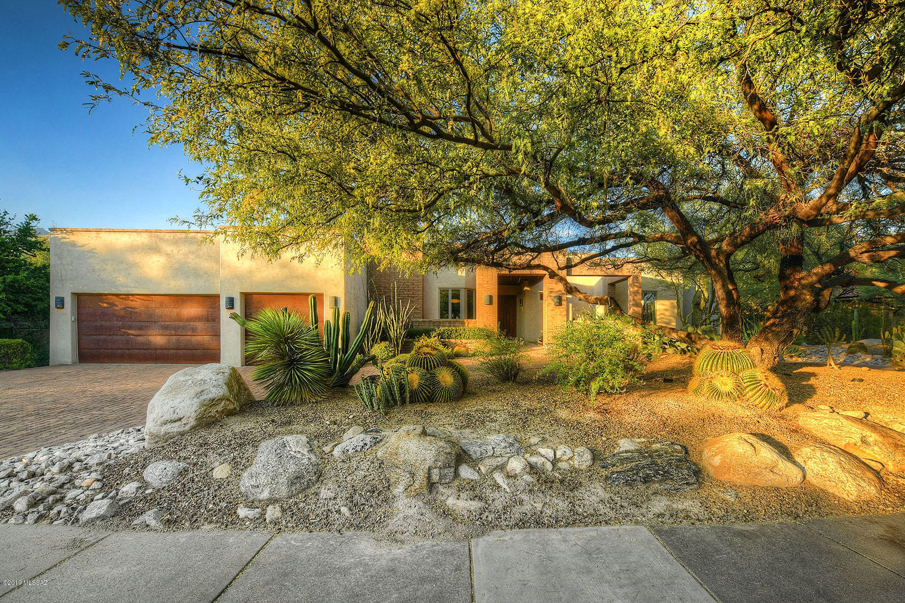 Beautifully remodeled Ventana Canyon home is the epitome of golf course living. Completely renovated in 2009 with the best finishes & amenities combined with all new mechanics, plumbing and electric. Dazzling light fixtures highlight the expansive great room which features floor to ceiling windows that frame the picturesque mountains & golf course views. Gourmet kitchen offers top of the line appliances, custom cabinetry, generous island with prep sink and concrete counter. Master suite opens to expansive patio overlooking the 7th fairway while offering cozy fireplace, 2 walk in closets and garden tub. Flexible floor plan has media rm, large office w/ stunning views, & add'l guest quarters with private patio and separate entrance. Fabulous outdoor living area with large covr'd patio & BBQ