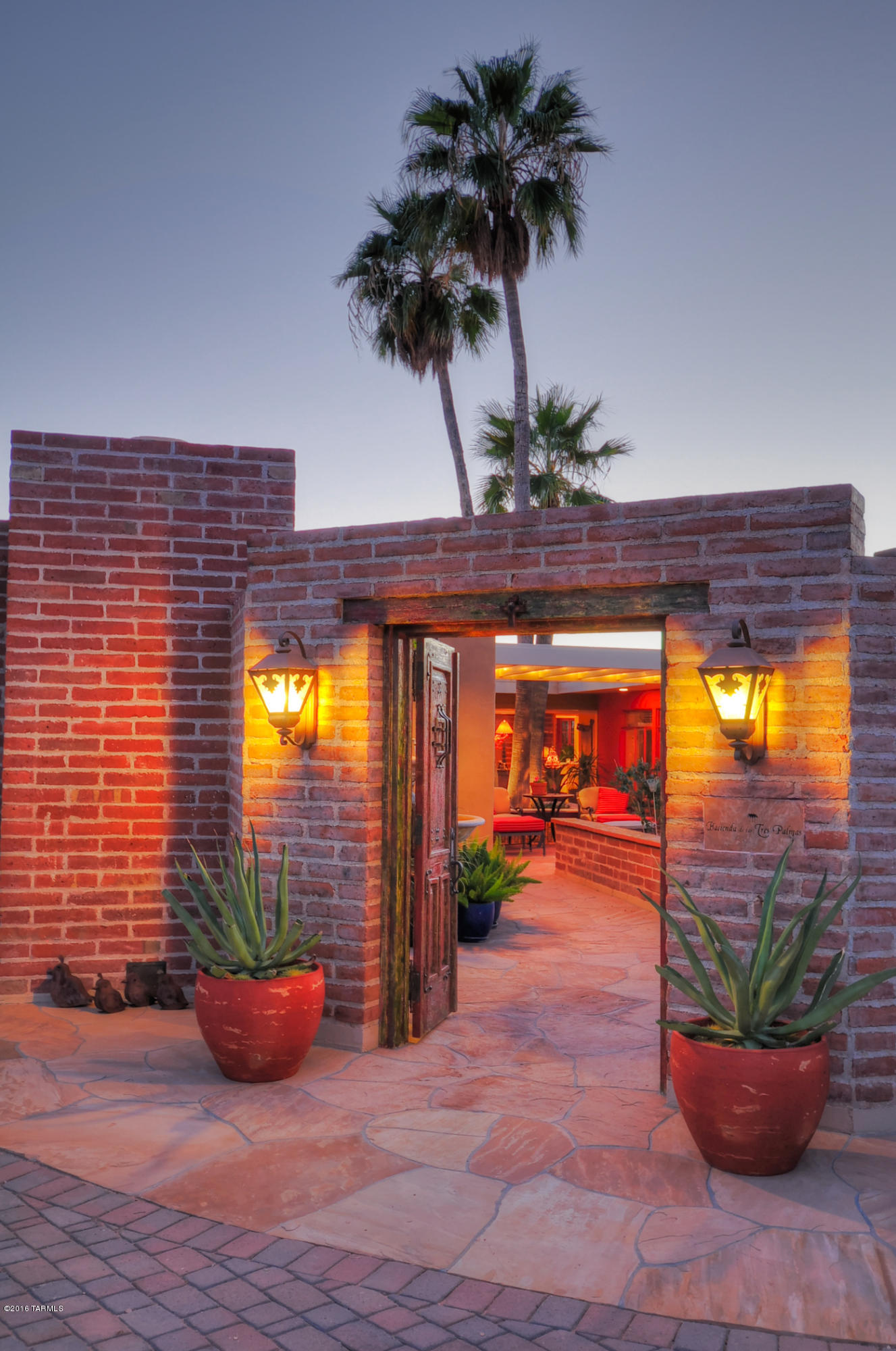 VOTED ''BEST'' IN MLS REALTOR TOUR IN APRIL!
Stunning Mid-Century Ranch you will find in Tucson! Hacienda de las Tres Palmas sits High above Pima wash, at the end of a long drive. Tastefully updated estate,  featured in Tucson HOME Magazine & truly feels like a resort! 3,400 sq.ft. of glorious indoor lvng. space and a whopping 2,800 sq.ft. of outdoor entertainment areas including a custom stainless & granite exterior kitchen, flagstone flooring throughout, custom tile on fireplace surrounds and in  bathrooms, built-ins, whole house sound system, new Anderson windows, and recent landscaping front & back. Generous master suite has its own enormous owner's office, walk-in closet, laundry room, & outdoor stone-walled shower. Views & Privacy! If you love the Arizona lifestyle, this home is you