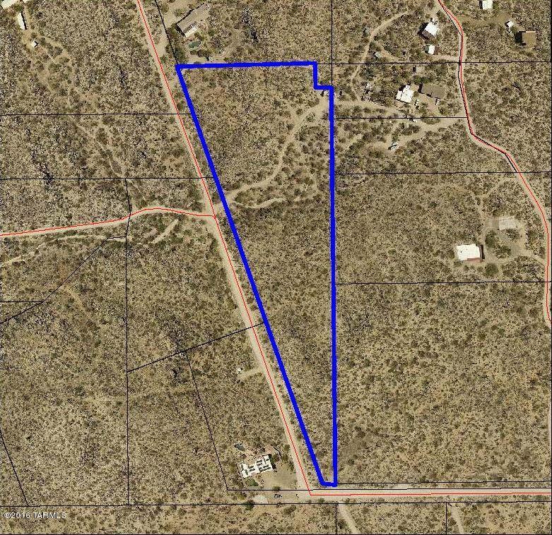 SELLER WANTS THIS PROPERTY SOLD! HUGE PRICE REDUCTION ON THIS ABSOLUTELY SPECTACULAR 6.68 Acre parcel located in the foothills of the Tortolita Mountains. Maintained road w/ electric & telephone located adjacent to the property. Incredible 360 degree views which include views of the Catalina, Tortolita, & Tucson Mtns. & all the way to downtown Tucson. This property offers more than one location to build your dream home. Well associated with well share agreement is no longer viable. New well will need to be drilled. Sold AS-IS.