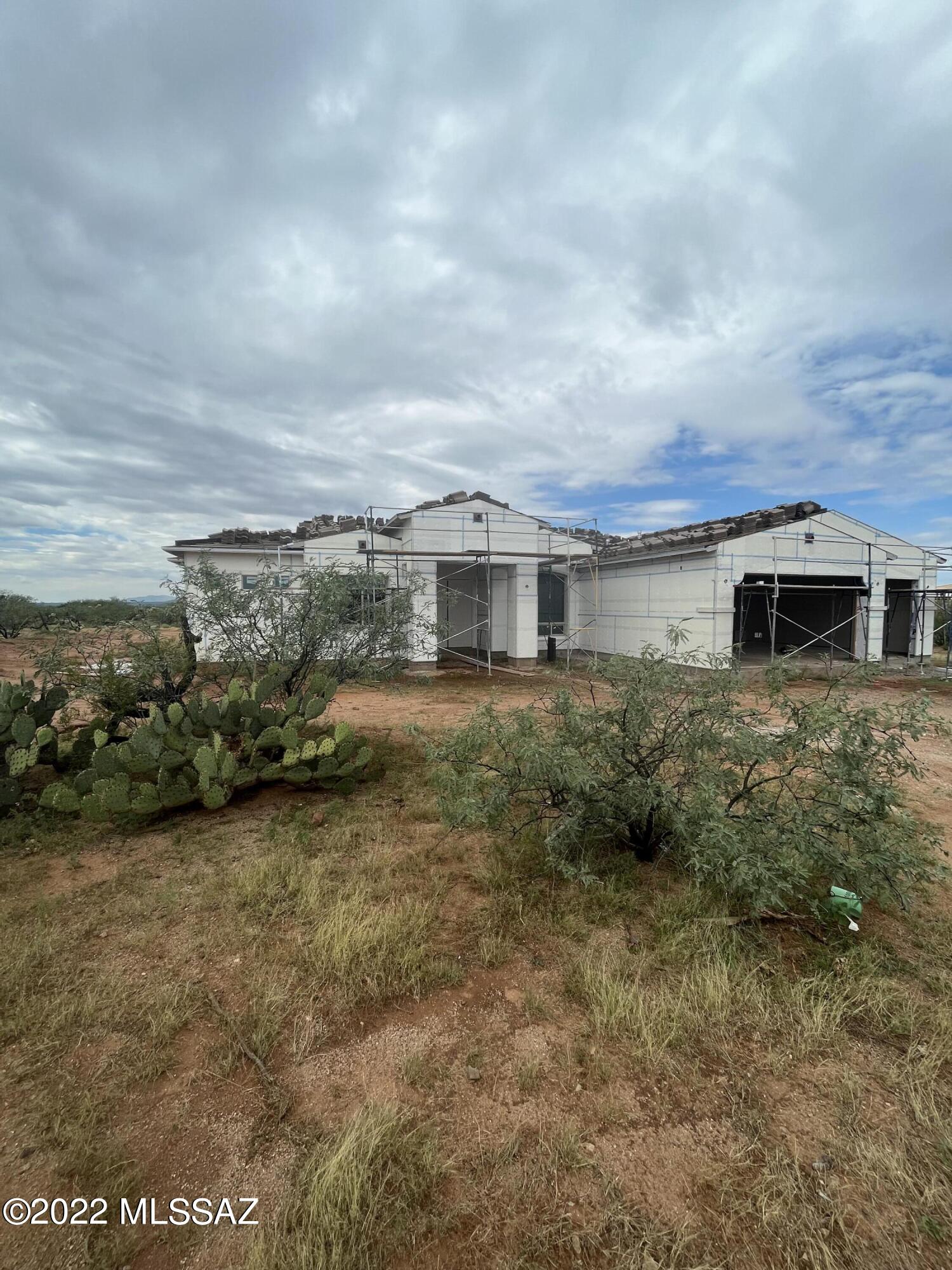 Stunning Views. Secluded, gated community with large home sites. Builder includes brick paved driveway and walkway. 5ft slump block wall around back yard. Complete landscaping in front.  Kitchen Aid appliance package, 4' garage extension. This house is framed and will be ready for move in 4 months.