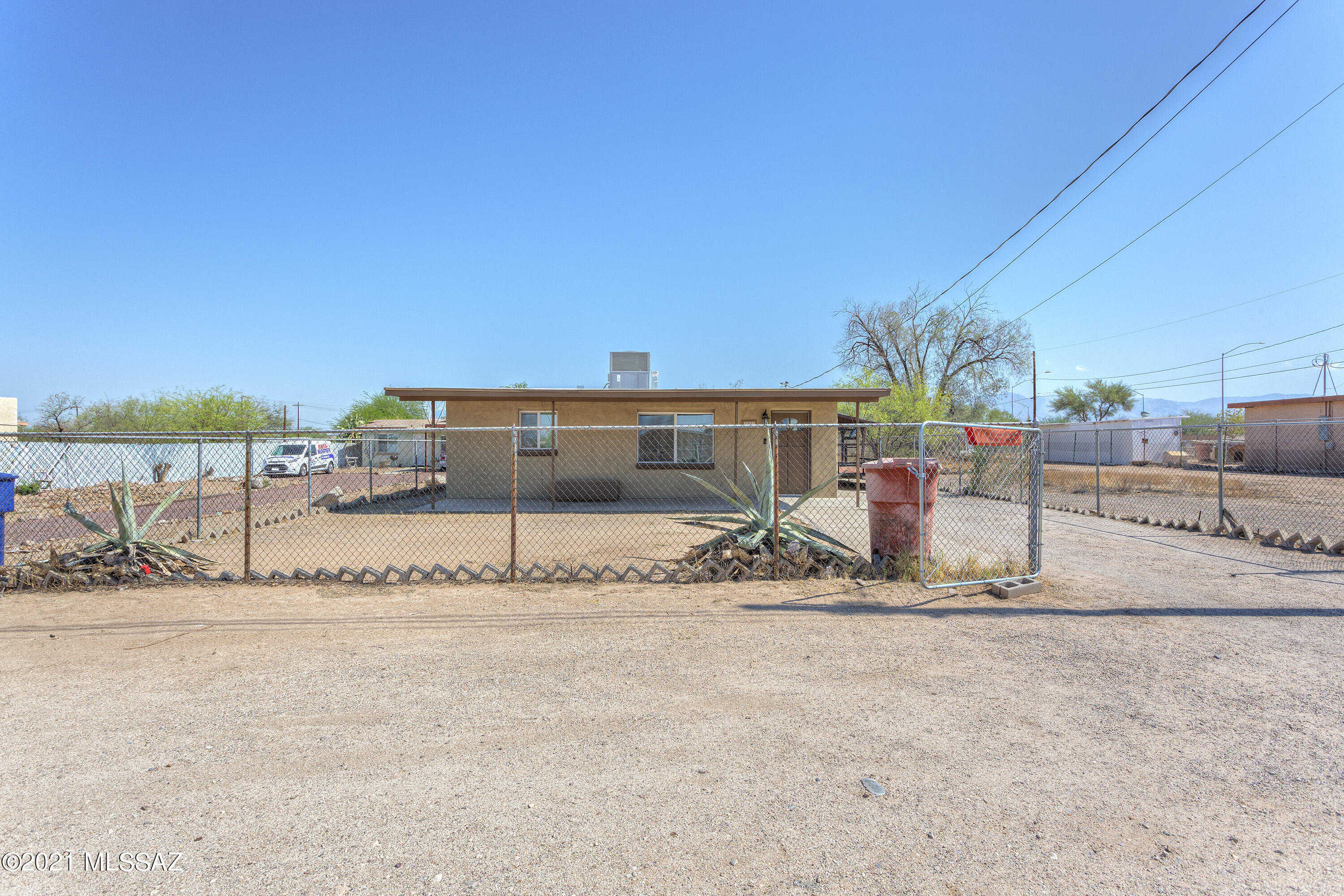 Beautifully renovated 2 bedroom, 1 bath home, with huge yard, conveniently located! This home has it all with updated cabinets, laminate countertops, laminate flooring, tiled in shower, new windows, doors and so much more! Oversized extended patio and large shed located in the rear.