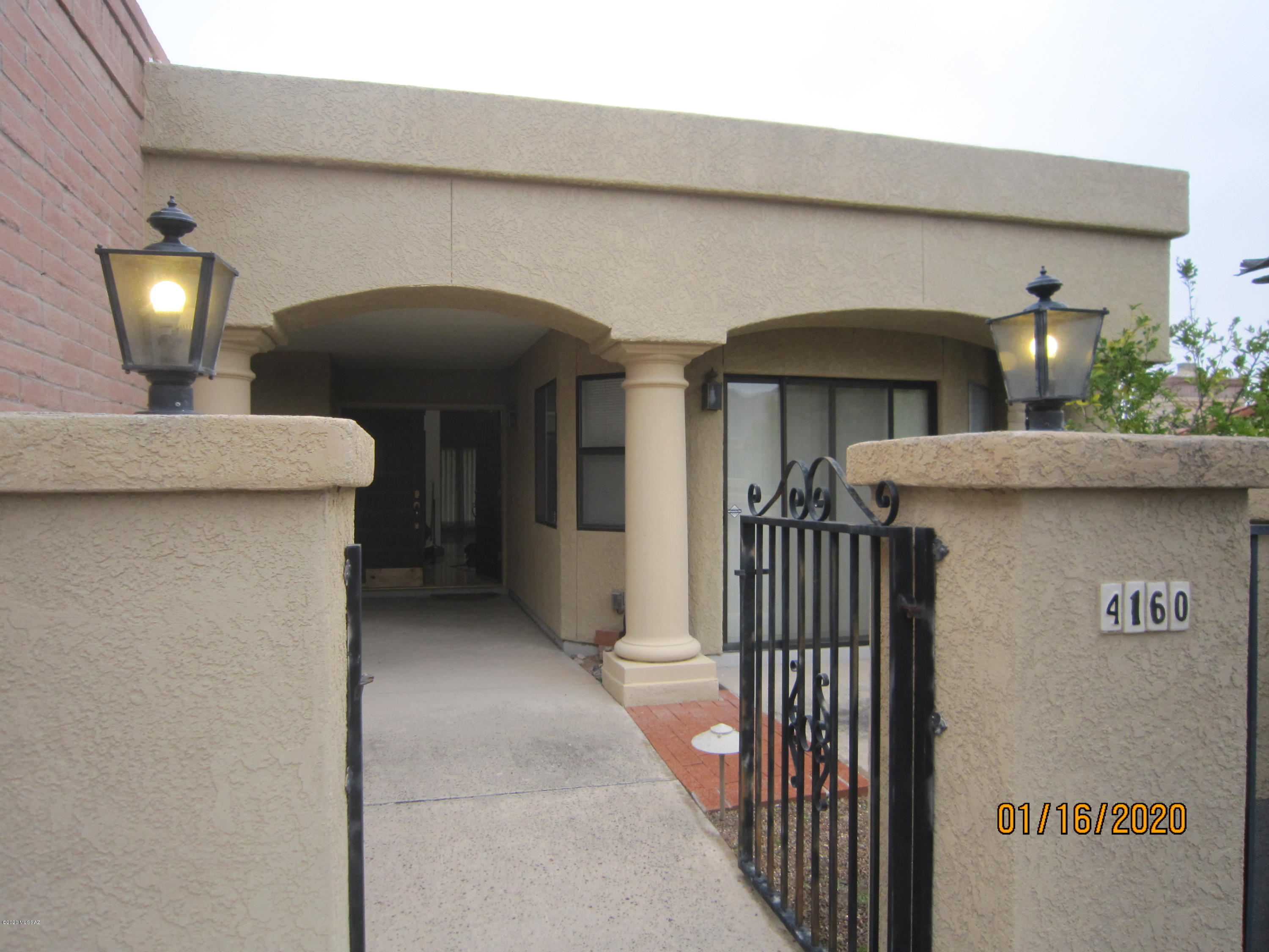 Sunrise & Pontatoc - Gated Community - Entry courtyard leads to Marble Tile Entry with atrium and open living area with Vaulted wood beam ceilings, wood flooring and fireplace overlooking lap pool just beyond the patio. Updated kitchen with granite countertops & stainless steel appliances, built-in wine fridge. Dining Area overlooking Catalina Mountains - unobstructed views! Professionally landscaped yard with Fruit Trees. Security System, District 16 Schools, Gated Community, Private Pool, Close to Catalina Foothills High School. Located at end of cul-de-sac with great mountain views - very private!