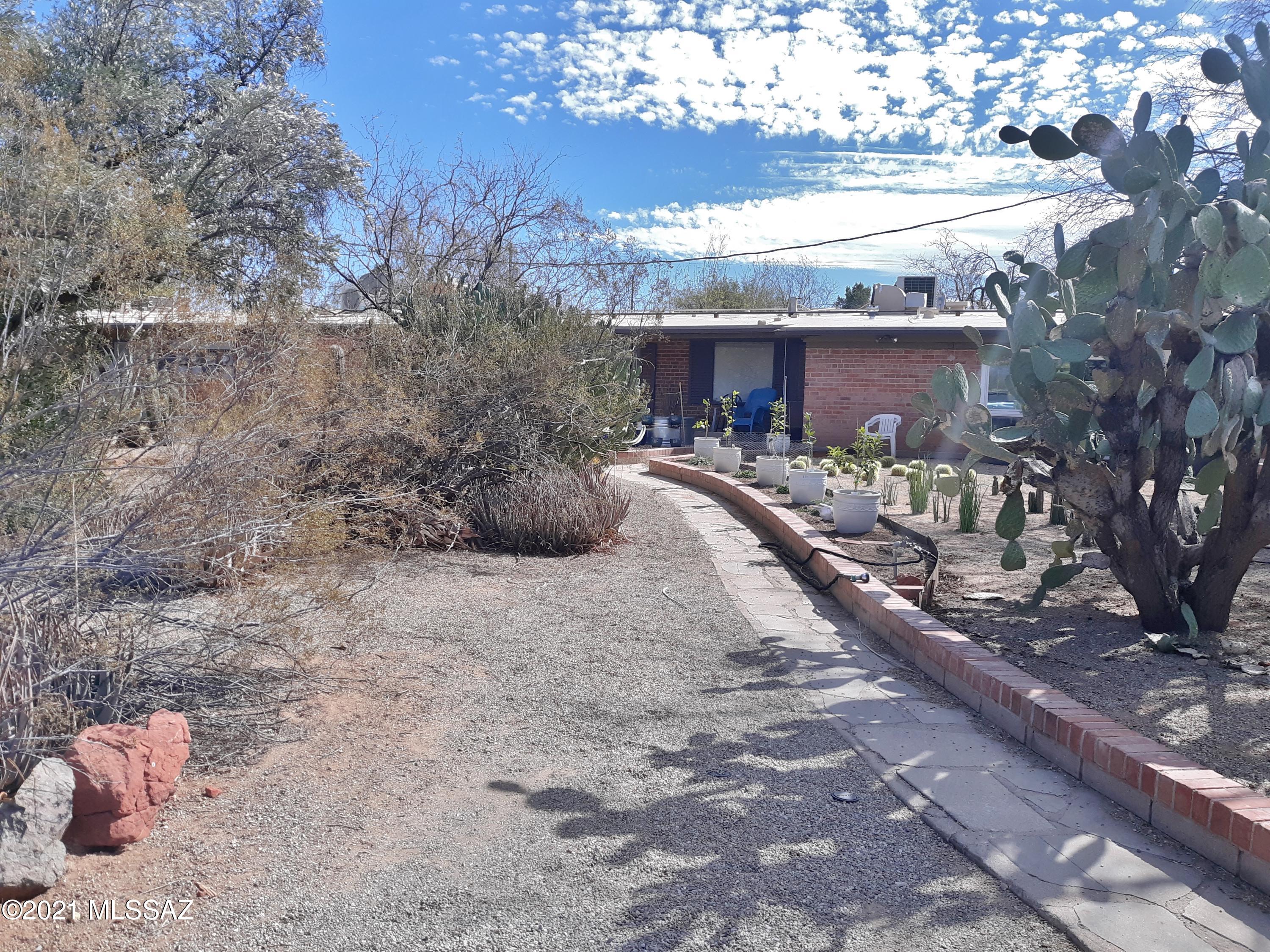 Five units located in Miramonte on the 3rd St bike path. Private gated access with a large .61 acre lot. Very unique with no two units alike. Reflective of the modern architectural era of the 1960s with slanted ceilings, large open floor plans, exposed red brick interior walls, painted concrete floors, floor to ceiling window and sliding glass door openings and glass block accents. Some units have covered parking and very large private fenced yards. Many upgrades completed to include mini-split ACs, plumbing, electrical and interior upgrades. One unit is undergoing a remodel and will not be completed. Owner occupied with historical rental income well below market. This is an incredible opportunity for the creative minded buyer. For additional info see marketing brochure under document tab.