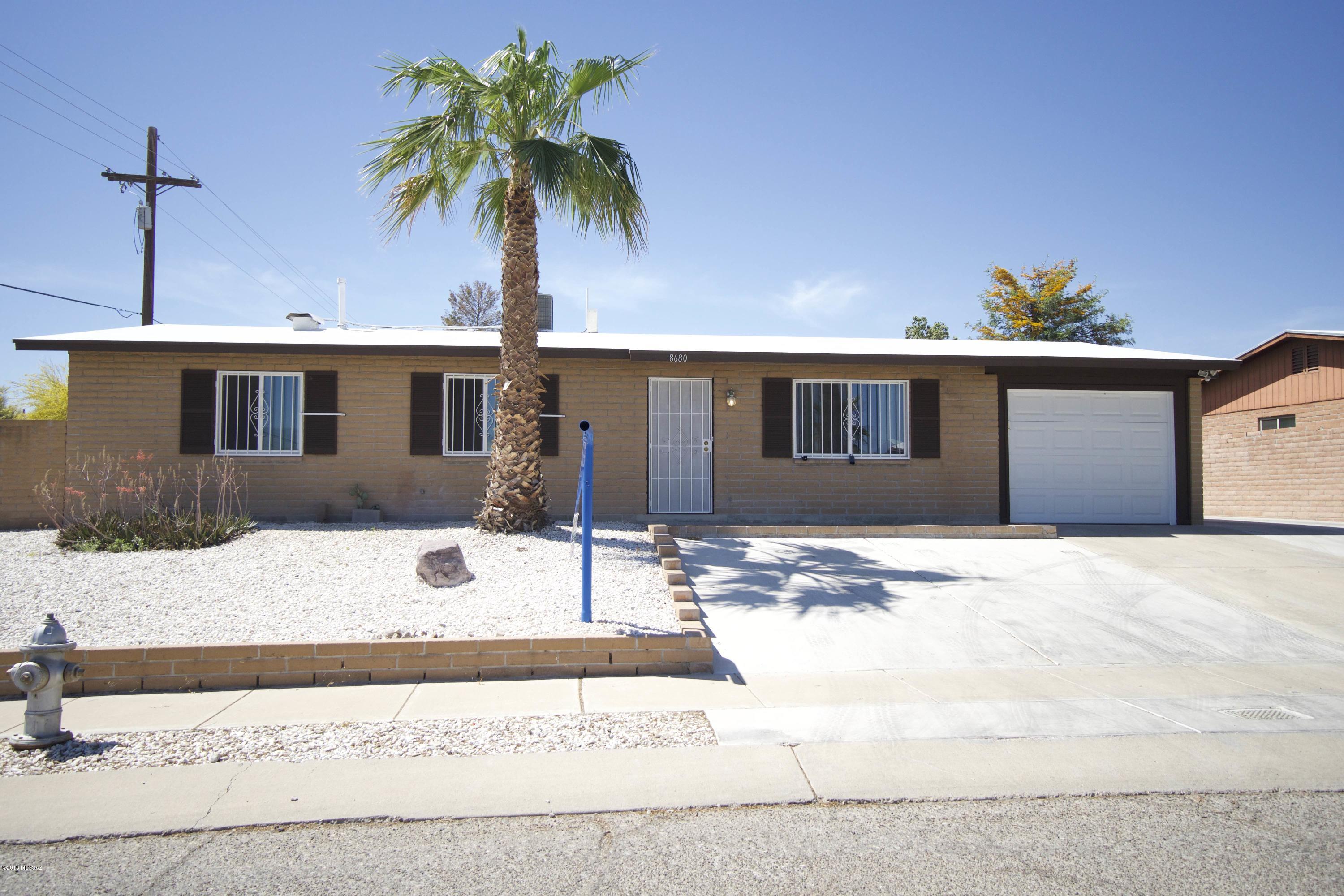 3 bedroom, 2 bath home located on a large elevated corner lot with double gate access. Home boast 1238 sqft of ceramic tiles.  This home is turn key ready with Brand new paint and an updated kitchen. AC was installed approximately 4 to 5 years ago. All appliances convey. Low maintenance front and back yard.

Schedule your showing today!!