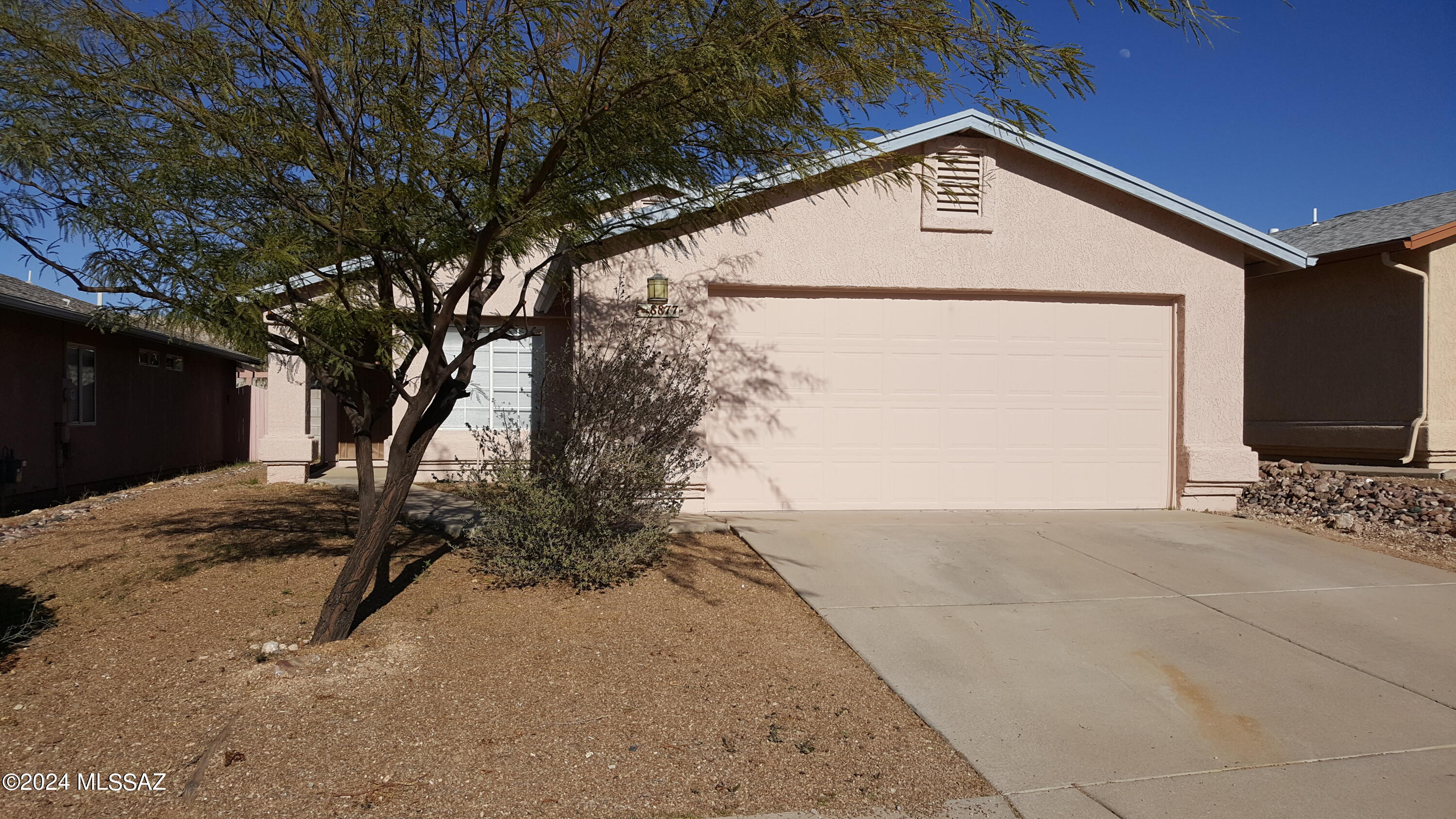 Charming 3 bedroom 2 bath with 2-car garage & lots of interior closet space. Nice kitchen cabinetry & beautiful wood interior doors, eat-in kitchen/dining area & spacious low-care backyard with large covered patio & lots of mature trees! This subdivision is well-maintained & has easy access to Kolb & I-10, shopping, dining, parks, Pima Community College East & more! ***UNIT IS VACANT AS OF 2/1***