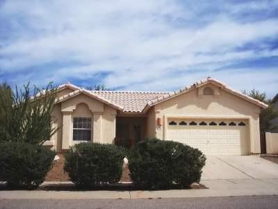 GRita Ranch in Hacienda Del Oro Subdivision! 3 bdrm, 2 bath, A/C, fireplace, ceramic tile and ceiling fans throughout! Kitchen has electric range, refrigerator, dishwasher, disposal, pantry and breakfast bar, separate laundry room with washer and dryer, master bdrm has walk in closet and mstr bath has garden tub and separate shower, large easy care back yard with block wall and covered patio, dbl garage, Cottonwood elementary school, Desert Sky middle school, and Cienega high school.