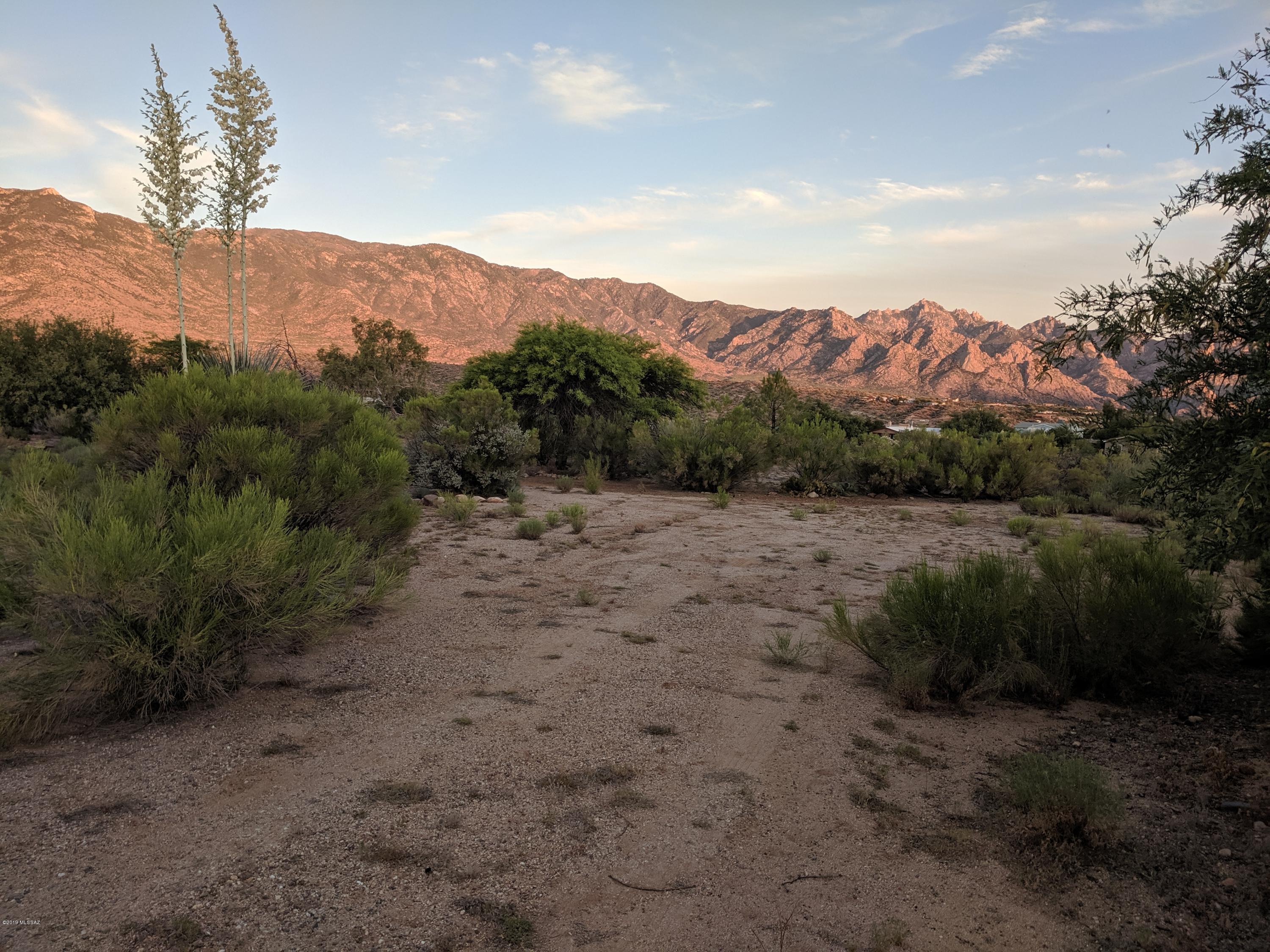 Owner will carry with reasonable down. Ready for development with views, views, views! This flat hilltop one-acre horse property is perfect for your next dream home--custom built or manufactured. Zoned GR-1 for variety of uses.