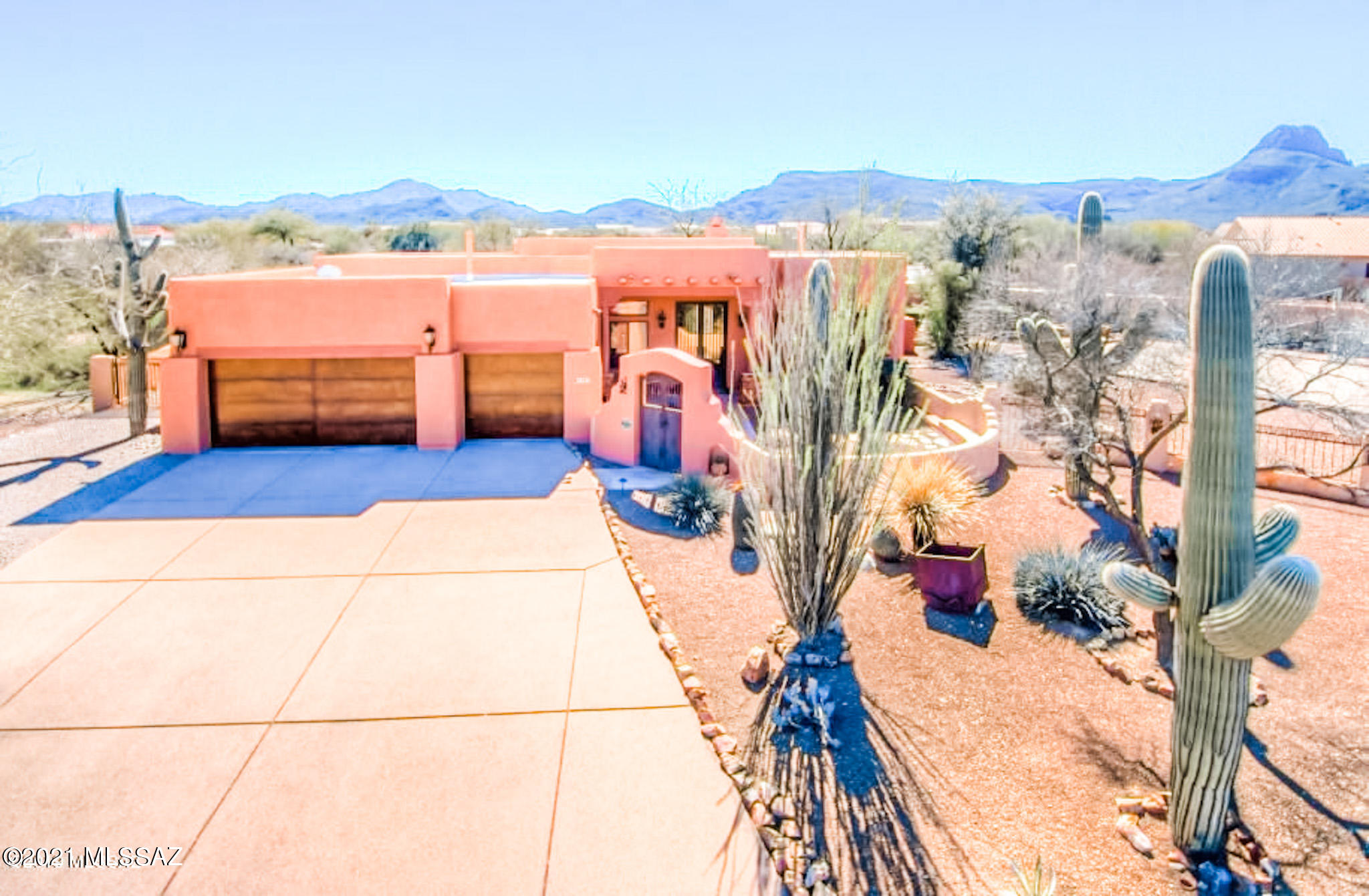 Welcome Home, Fantastic Northwest Location. On over an Acre with no HOA, this home has it all. 4 Bedroom, 2 Bathroom, 3 Car Garage w/ Pool and Spa. Private Courtyard with Decorative Wrought Iron Double Front Doors. Step into the Foyer, Formal Dining Room on your left as your walk into the Greatroom open to the Kitchen,  Island with Bar, Upgraded Kitchen Appliances and an Abundance of Cabinets. Split Floorplan, Oversized Master Suite with Huge Master Bathroom, Walk in Closet with Custom FInishes, Garden Tub and Walk In Shower. Truly a Backyard Oasis, Pool with Spa, Multiple Seating Areas, Outdoor Ramada with BBQ. Gas Fireplace outdoor and Sand Volleyball Court. Space for RV with Electric and Water Hookups.