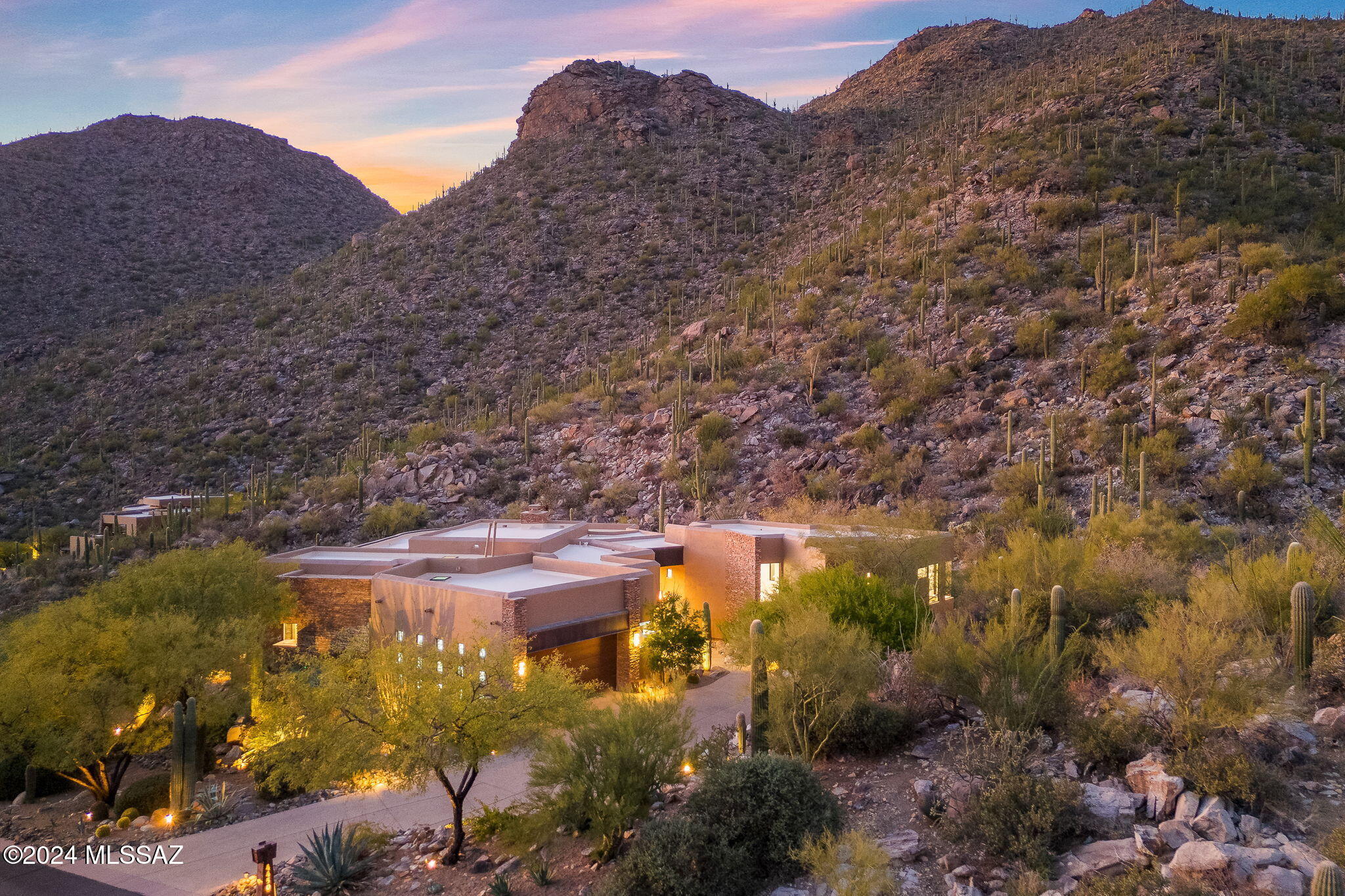 STUNNING DESERT CONTEMPORARY WITH SWEEPING PANORAMIC VIEWS IN CANYON PASS