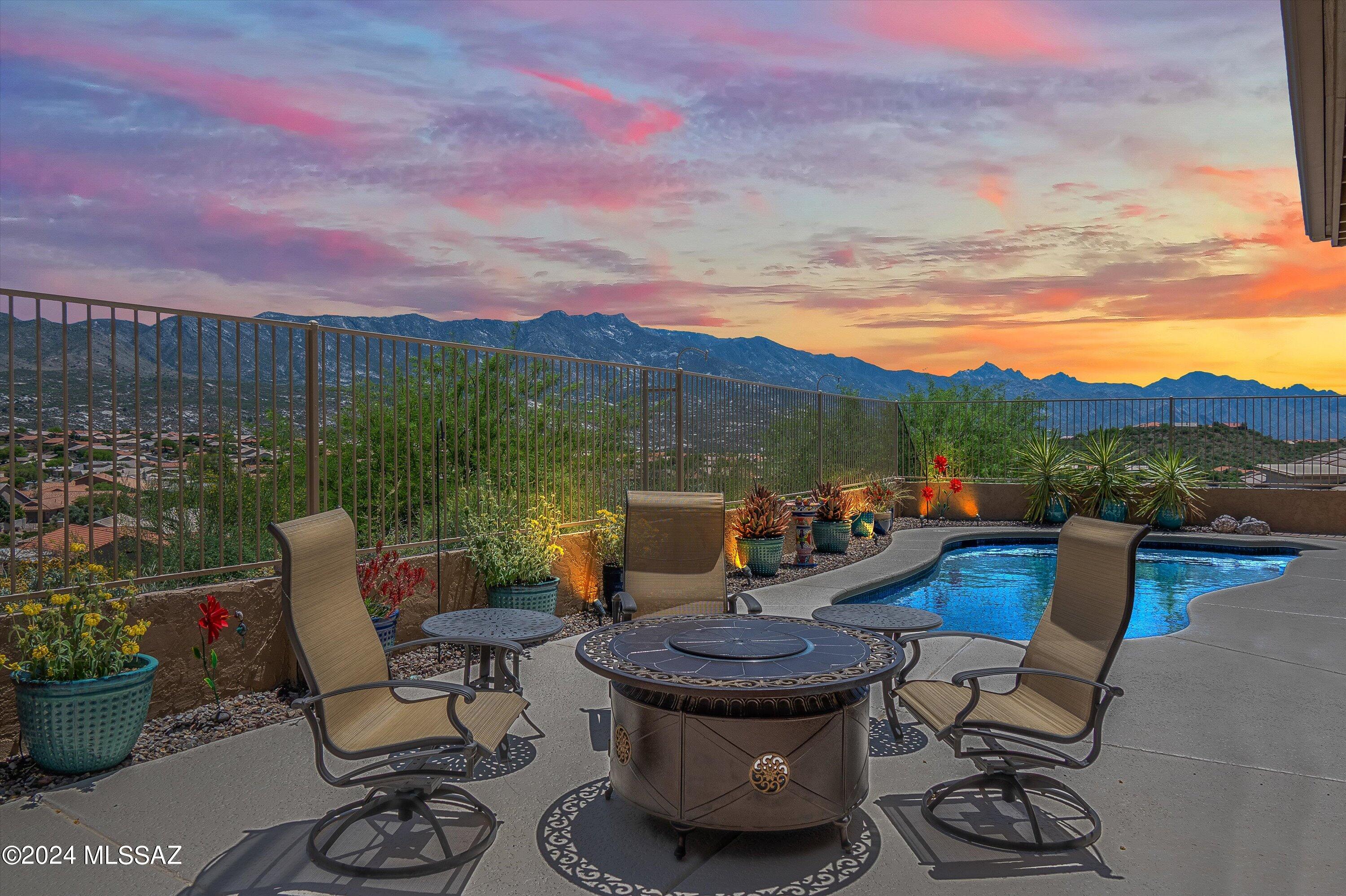 Panoramic mountain views front & back await in this beautiful, modified Durango model. With 3 bedrooms 2 ½ baths, convenient den with built-ins, + pool and separate Spa this home has it all. Sited on a hillside lot the beautiful landscaping and entry patio for enjoying sunset views welcome you to the double door entry and beyond where spaciousness and elegance abound. Gathering/entertaining space with formal dining area leads to family room w built-in entertainment center & bar overlooking the pool & mountain views. Open kitchen with lots of Cherrywood cabinetry, granite counters & stainless appliances. Spacious owner's retreat w plenty of room for sitting and enjoying the views opens to en-suite with double vanity, large tile shower, soaking tub, & 2 walk-in closets. Wide staircase with skylights leads to the upstairs casita featuring 2 bedrooms & bath with plenty of room for your guests.  Stunning mountain views form the backdrop whether entertaining on the expanded hardscape or enjoying some quiet time watching the mountains turn pink, in the beautiful pool and separate raised spa. Come and enjoy the best of the SaddleBrooke lifestyle.