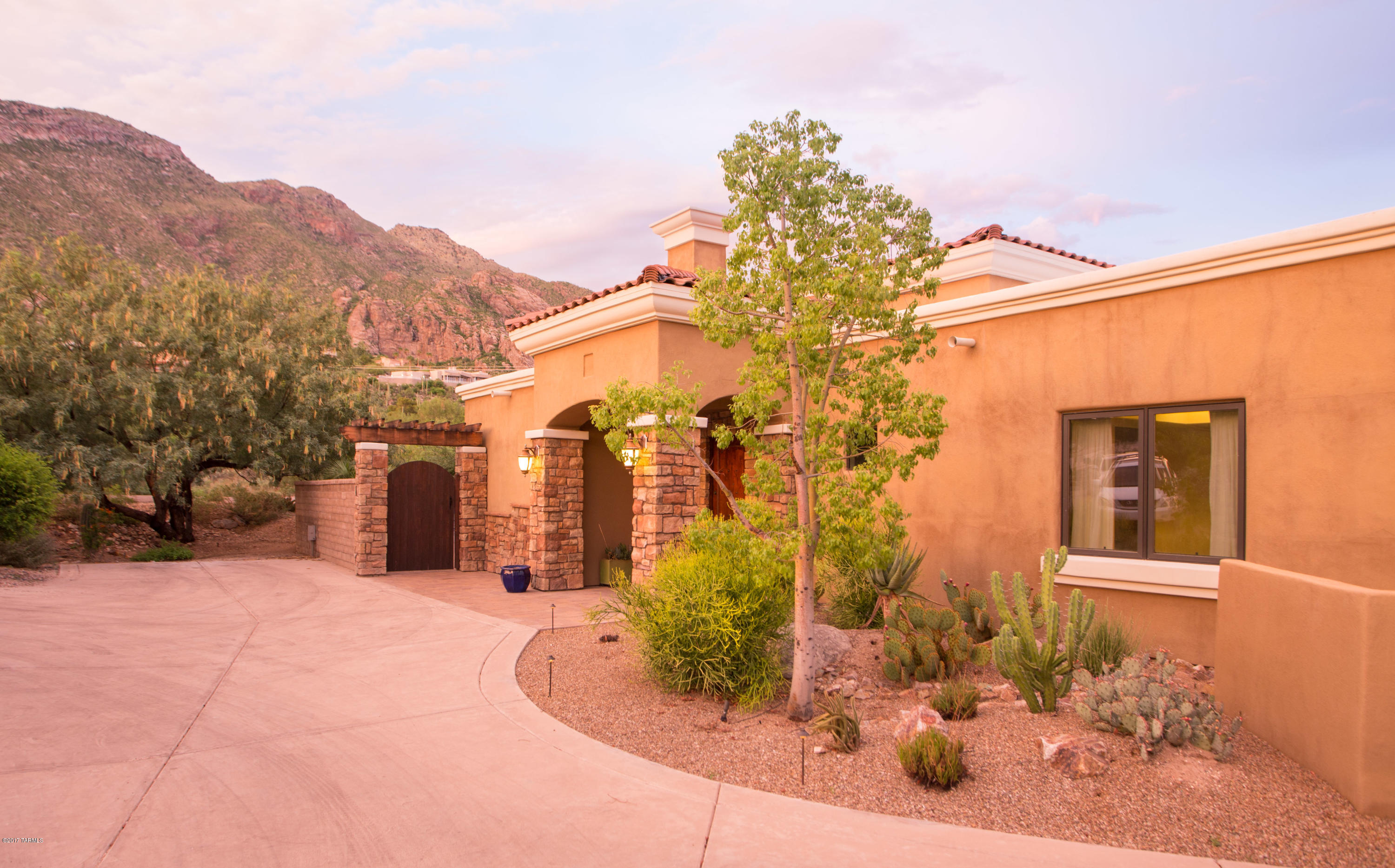 One of the finest homes in the Foothills for Under $775,000. Custom Contemporary home features an Open and Spacious floor plan, High vaulted ceilings with Wall of Windows in Family Room/Dining Room area, Fire Place & unobstructed Mountain Views; Chefs kitchen opens up to the Great Room Area w/ high end appliances, custom cabinetry, center island overlooking the great room area w/ mountains views the North and City Lights to the South; Large Master Suite; 2 additional spacious bedrooms & bathrooms;  Zoned Heating/Cooling,  & much more. Exterior features enclosed yard to the North with Breathtaking Mountain Views and Large Covered Patio to the South overlooking the City Lights.  Shows like a Model and you will not be disappointed.
