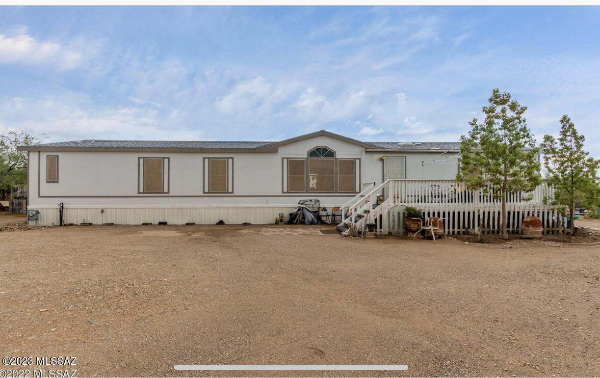 Spacious home with 4 bedrooms, 2 baths and a bonus room on over an acre lot. Bring all your toys, there's plenty of space. Low utilities with solar system. Enjoy the Tucson night skys on your front deck. Hurry, don't let this one slip away.