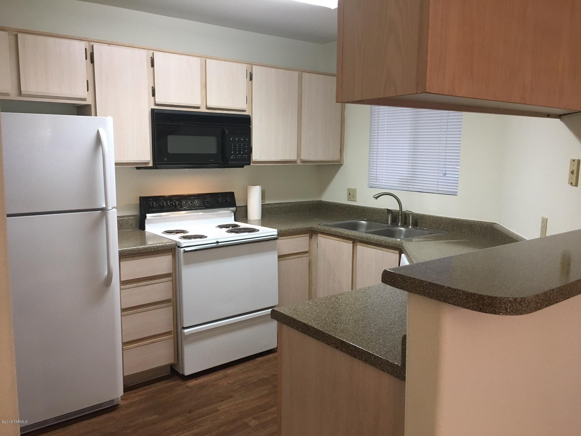Wanting to be close to the pool and fitness center? This is it!!The ultimate split floorplan with one bedroom on each side of the home separated by the great room. Both have walk in closets, both sides of the home have their own bathroom and linen closet. The amount of closet space in this condominium is amazing!! Private patio with storage room, too! This gated community is within walking distance to 5 restaurants, grocery store, CVS, post office +++!