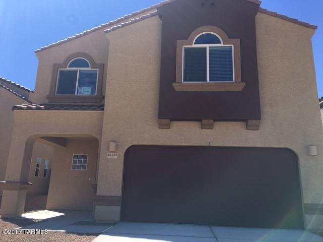 Fantastic opportunity to rent a newer home featuring all the latest technology and Energy Star products. Gorgeous kitchen features granite counters, Stainless Steel GAS range, microwave, refrigerator and dishwasher. Additional features include and a new washer and dryer, tile, tankless water heater, recessed lighting, ample storage and covered patios and spacious yards. Situated in the heart of the Vail School District, and minutes to new shopping centers and close proximity to downtown Tucson and I-10, and Davis-Monthan. Pets considered with owner approval.