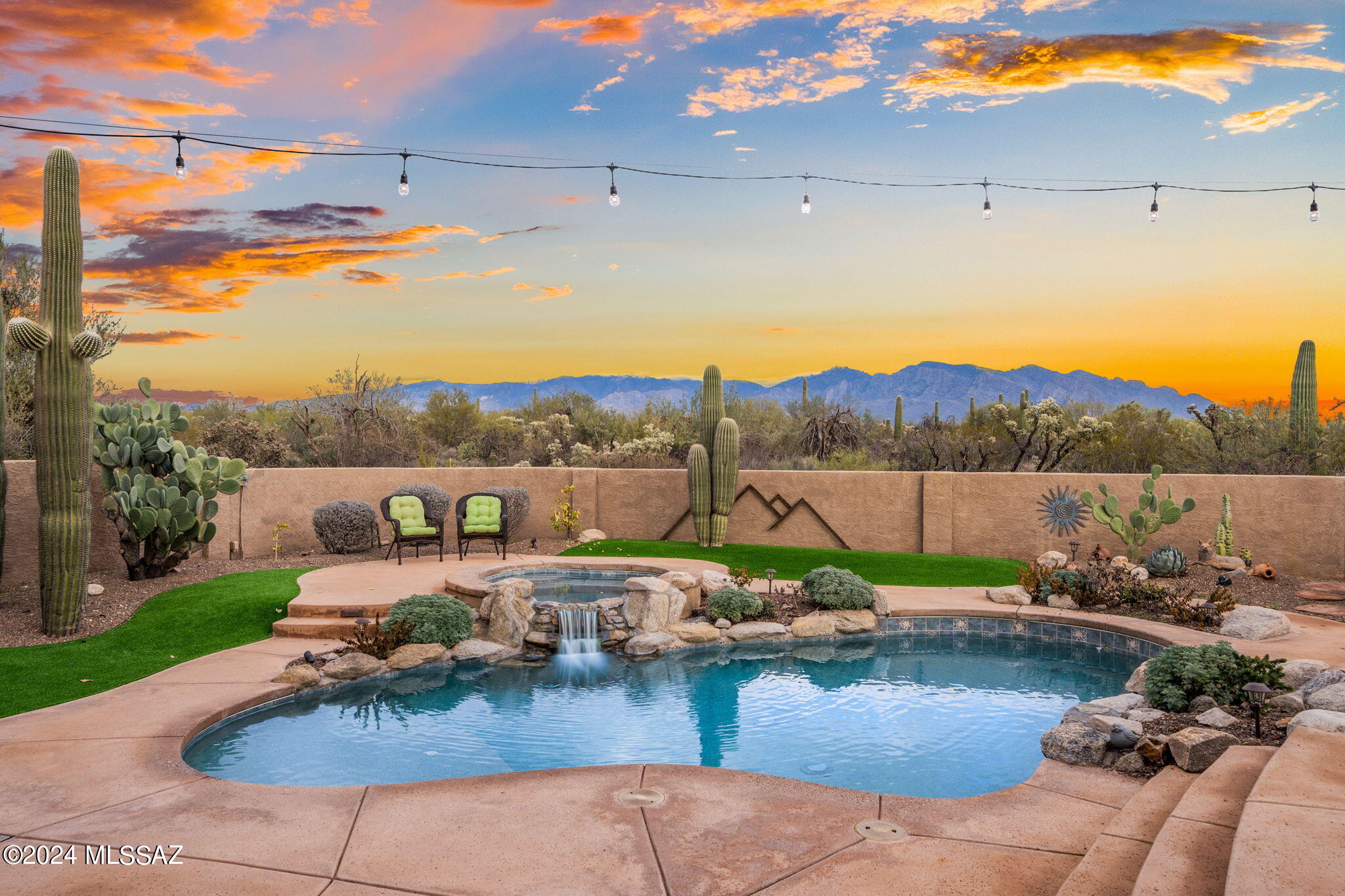 One of a kind property! This well-appointed residence will check all the boxes. Hard to find 6 car garage spaces for all your vehicles, as a separate workshop or make it a really cool hangout. This custom Ducati built home is located at the end of a cul-de-sac consisting of 8 homes affording it the unobstructed Catalina Mtn views that dreams are made of. Arrive via the stately extended driveway to the front entry that welcomes all with its picturesque courtyard and serene fountain. Enter the residence through 8 ft double doors to the foyer leading into an expansive great room. Catch a glimpse of the scenic mountains through the picture windows next to the floor to ceiling stacked stone fireplace. Entertain in the formal dining room, kitchen bar or vast outdoor patio with built-in BBQ..... refreshing pebble-tec pool and spa.  The list of improvements and assets include: artificial turf; New BBQ; New refrigerator, W&D; New pool pump & heater; dog run.