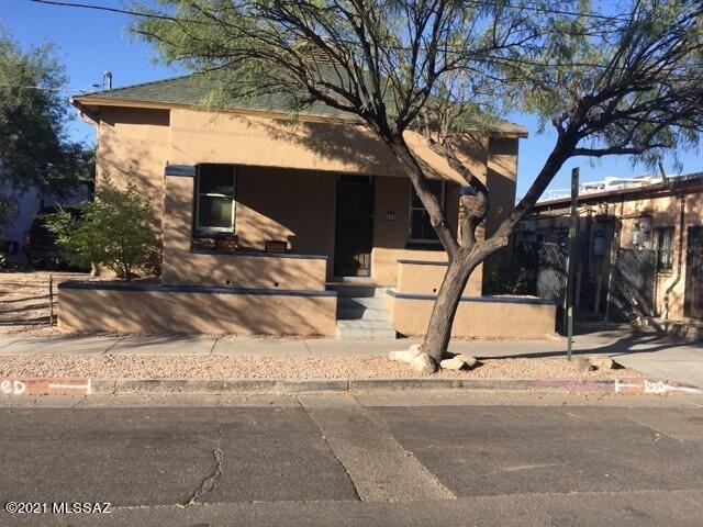 Gorgeous 1905 mud adobe home right off of 4th Ave. on 5th Street. Street car stop just a few steps away along with many restaurants and shops. Two permitted parking spaces, walk to the U of A, downtown in just a few minutes. Registered with the national historic registrar, this means you pay less in taxes! Original wood floors are amazing. Updated triple pain glass windows, Updated electrical and AC, updated bathrooms and kitchen. Other features include California closest, and an extra insulated roof for lower energy bills. Come see this one of a kind down town gem!