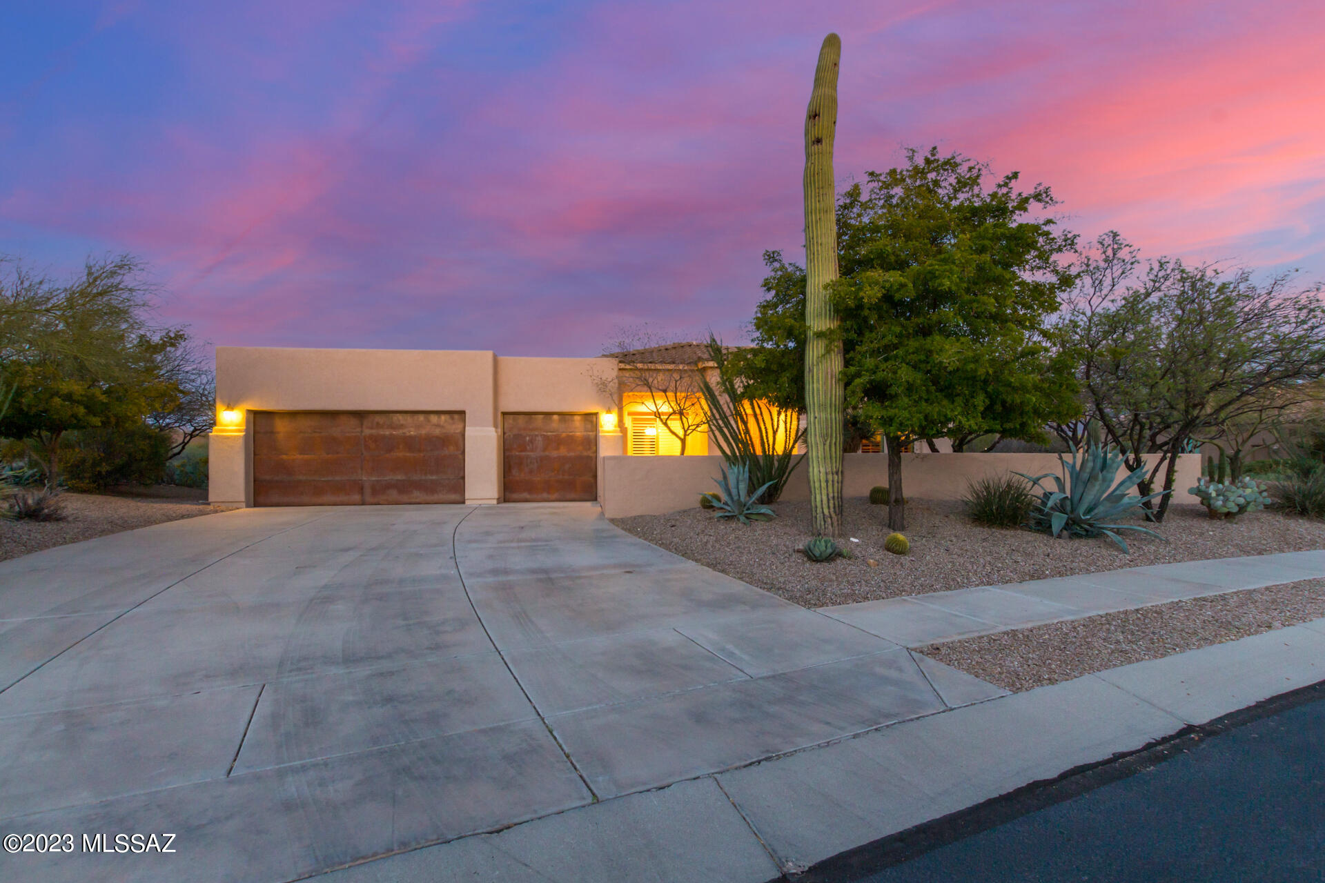 Breathtaking views!! This beautiful, well-maintained 4BD/3.5BA +Den (2,868 sq ft) home in the coveted Vistoso Highlands neighborhood is one you will want to see! The oversized 0.6 acre lot provides privacy all around. The bright and open floor plan is perfect for entertaining guests! This home has been extremely well cared for and has new paint, new HVAC in 2022, soft water system, roll out shelves in all cabinets throughout the home, large oversized garage with built-in cabinets, and so much more! Owner/Agent