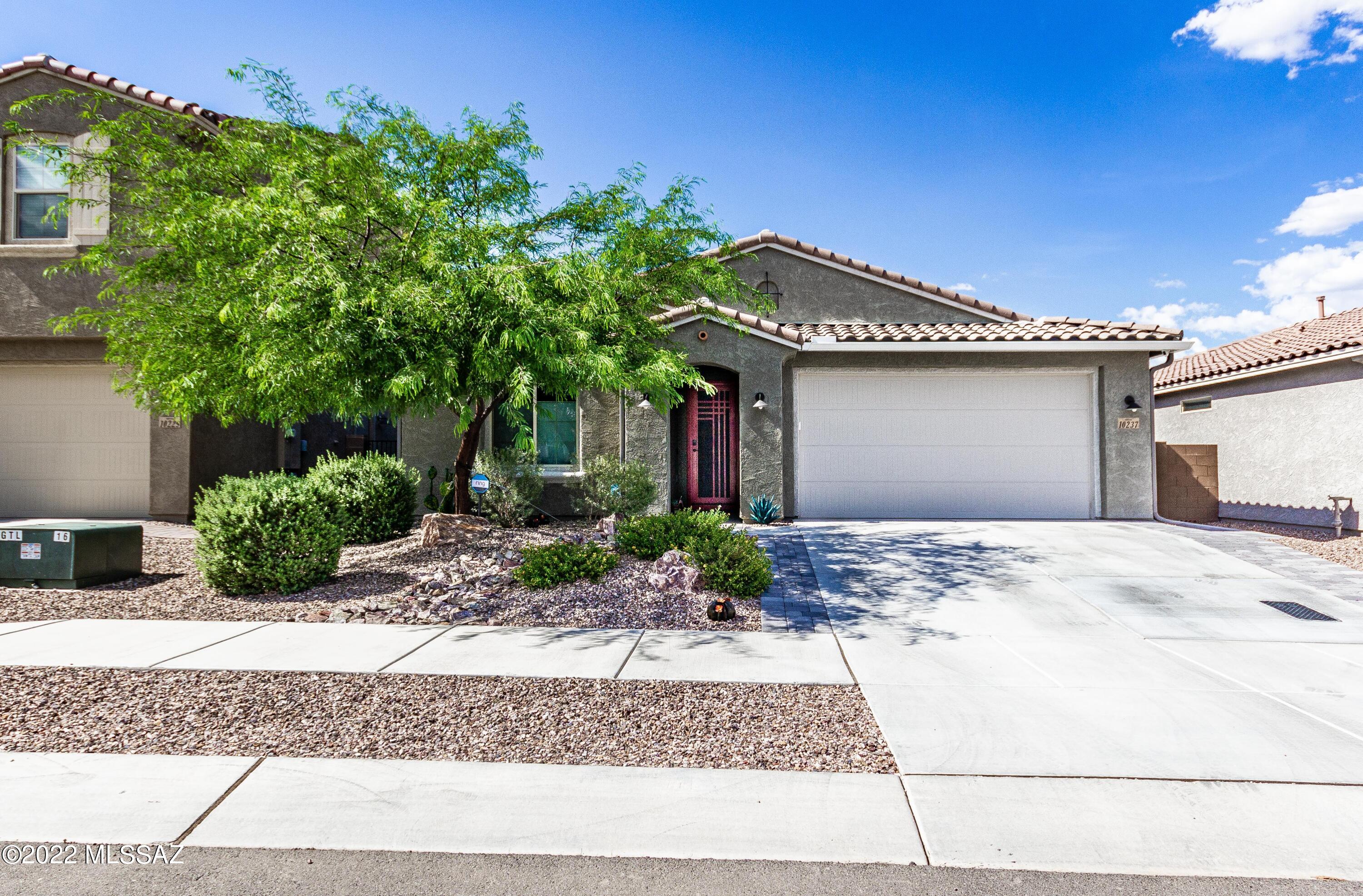 3yr young home with beautiful upgraded home has it all, 2 b/room 2 bath PLUS den ( could be 3rd b/room). Gourmet kitchen with 5 burner gas stove and stainless range hood and large granite counter island, disposal with loads of recessed lighting. Culligans water softener and purifier with reverse osmosis. Low care rear yard with turf ,gas fire-pit, extended patio with pavers  . there are also 5 ceiling fans ,one in the rear patio. Gutters have been installed around all of the house. Custom window coverings in home which is in a fiber optic neighborhood...Jacuzzi does not stay with property