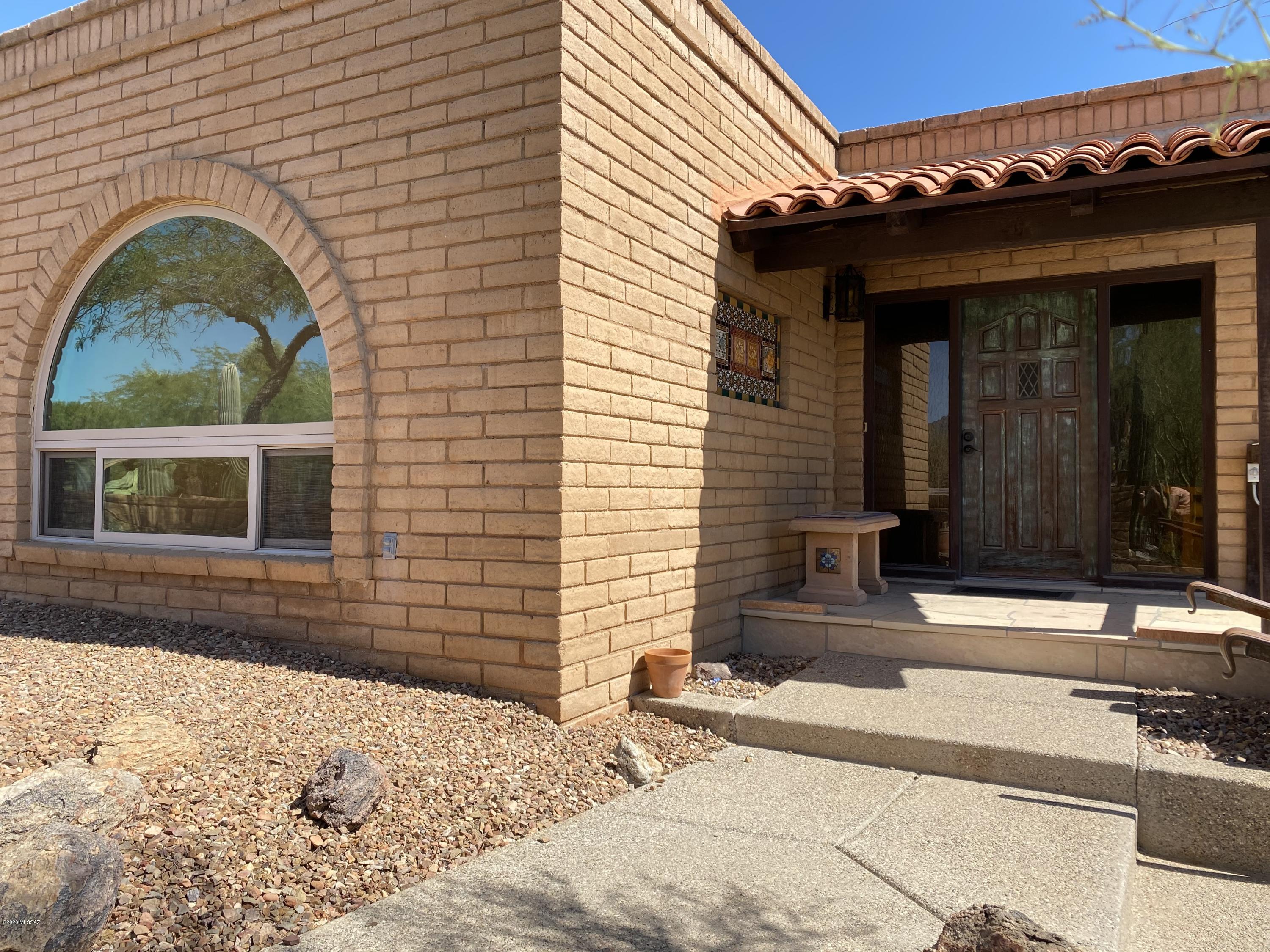 Come enjoy the breathtaking views of the city and mountains from this wonderfully well kept home that sits on a little over an acre of land. Enjoy the pool and spa which are perfect for entertaining, overlooking the city lights at night yet quiet and tranquil.  The pool pump was just replaced in 2020. The interior features exposed beams, a beehive fireplace with wood flooring and ceramic tile throughout. This home has two upgraded energy efficient A/C units that were installed in 2019 and Milgard Windows.  Bring your RV to park in the covered parking with no HOA or CC & R's to abide by. This home is ready for your special touch. 

This is an estate sale and the house is sold as is.