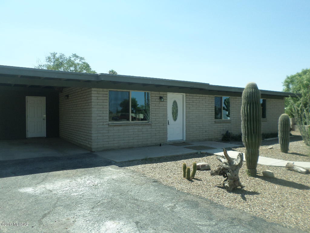 Great home on a cul-de-sac.  Spacious, open floorplan with a huge fireplace in the family room.   Fresh interior paint, new carpet in the bedrooms, and ceramic tile in living areas.  Brand new SS appliances, tiled back splash, new counter tops in kitchen.  Updated baths.  Covered back patio, sparkling pool and storage unit in the large back yard.