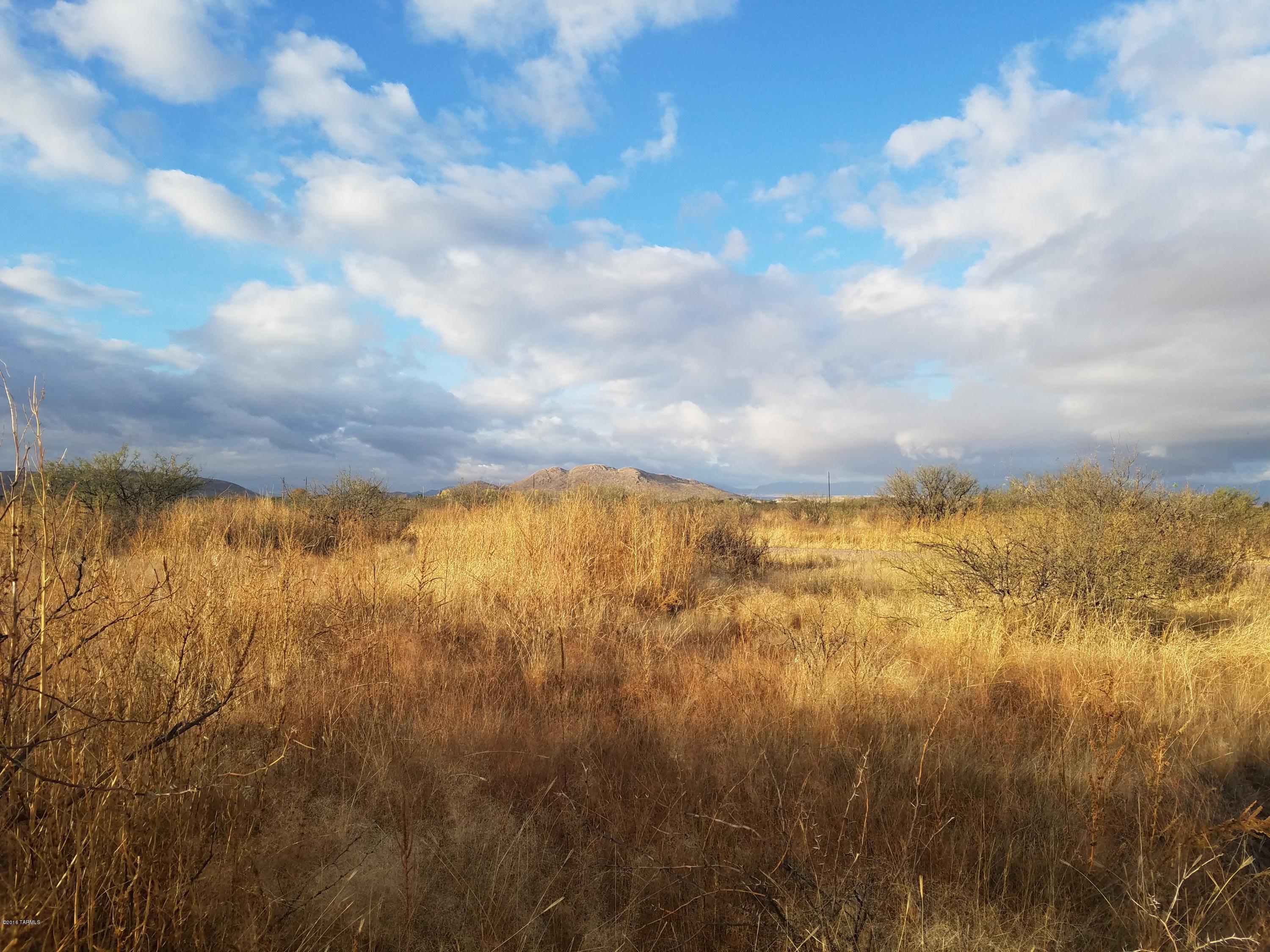 Wonderful corner lot not far off paved road to build your dream home.  Beautiful mountain view flat level land.
