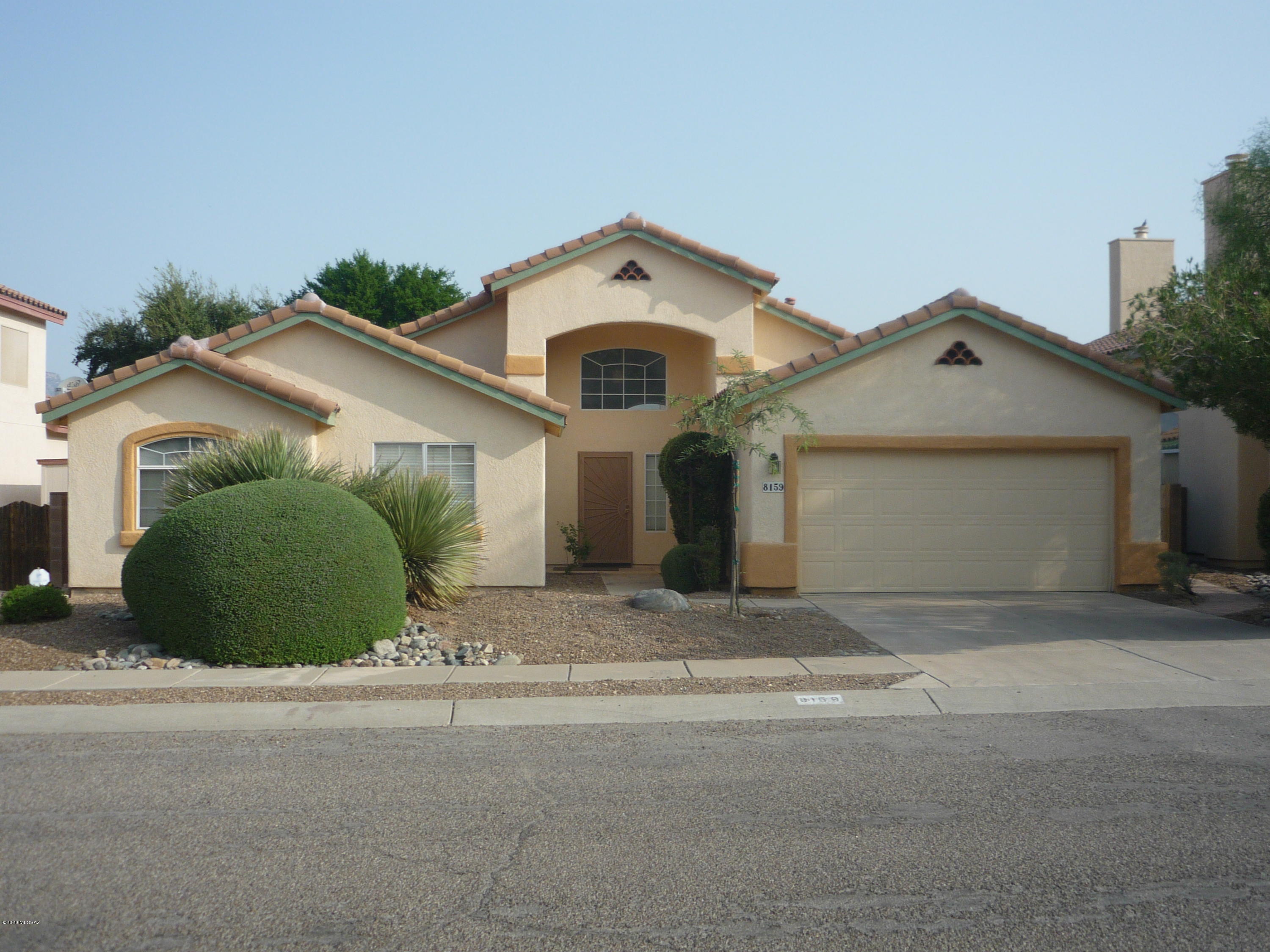 Freshly painted 4 bedroom/ 2 bath spacious home features wood laminate and tile floors.  Kitchen has side by side fridge, built in microwave, granite counter tops and pantry.  Cute bay window breakfast nook. Family room with fireplace.  Also formal living room with fireplace and formal dining  area. Master bedroom with access to back patio, master bath has separate tub and shower along with double sinks.  Hall bath has single sink vanity and bath/shower combination.  Relax on the patio and enjoy the backyard.  Very convenient location.  Pets considered with additional deposit.