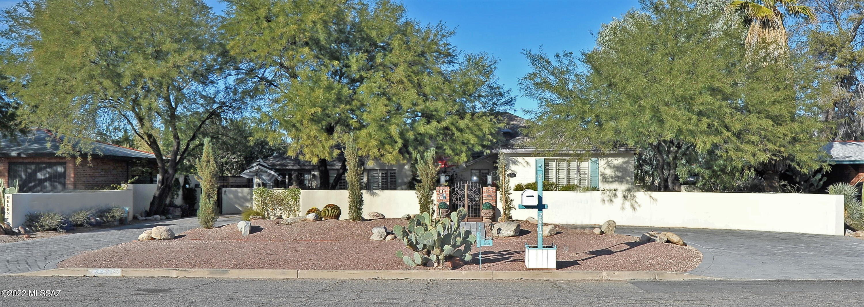 Resort style living. Just under a 1/2 acre in the middle of town. Lot 123-08144A INCLUDED IN SALE! Walkable to EVERYTHING! This Historic European style home has it all. Wood, marble & travertine everywhere. Custom kitchen cabs by furniture designer, custom built in library. High ceilings w/ crown/ coffered details. Home features library, gym, office, 2 masters w/on suites. Gym has own entrance could be 3rd bedroom. Guest home has own yard, laundry, storage, entrance, parking. Rents 4 $1625-$2475. Full RV hookups. Full garden, barn, chicken coop, water cistern. So many private garden areas to see and enjoy. Custom architectural 50 yr shingles. Completely repiped.SUPER LOW PROPERTY TAXES! Only 1 fountains coveys. Lights above bistro table R only decorative. Sellers licensed to sell real esat