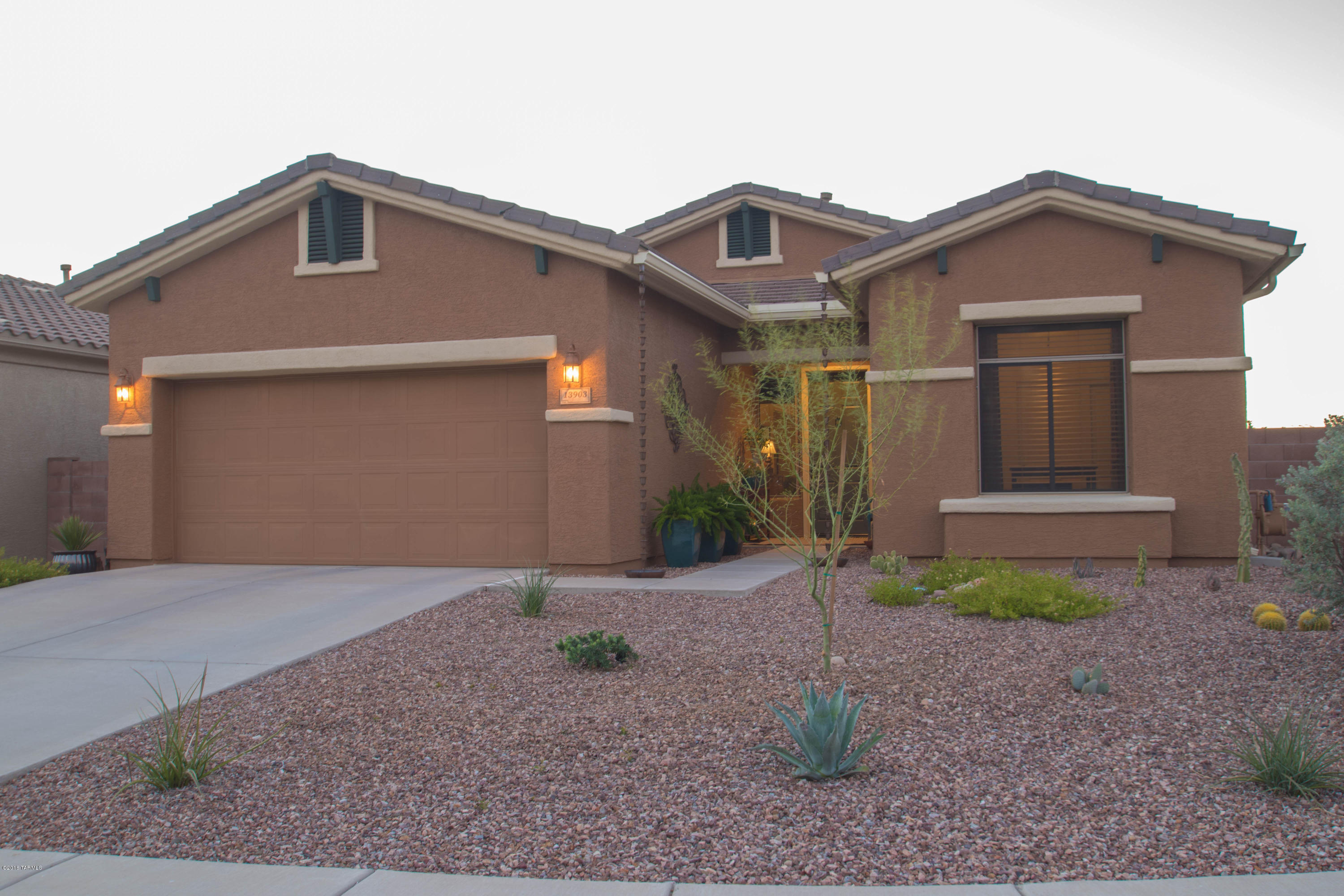 Vistoso Corner Private Lot w/ single story stunning home! Enjoy the Vista View of the Tortolitas and Catalinas and desert wash. Easy access to 27-mile hiking trail. Master walk-in closet w/ ensuite bath, executive height sinks. 10 ft ceilings and upgraded ceiling fans. 17'' porcelain tile. Kitchen w/ grainite, pull-out shelves, soft close, wine cooler, stainless appliances w/2-drawer dishwasher, pantry. Laundry w/ sink, granite and cabinets.Stunning Exterior, painted in 2015. Pebbletec heated pool, gas bbq island w refrigerator.Solar shades on all exterior windows and patio w/ roll-down sunshades to turn patio into all-season room. Eco friendly: new gutters with rain water harvesting. Citrus Trees, 2 car garage with insulated garage doors, and overhead storage. Must see