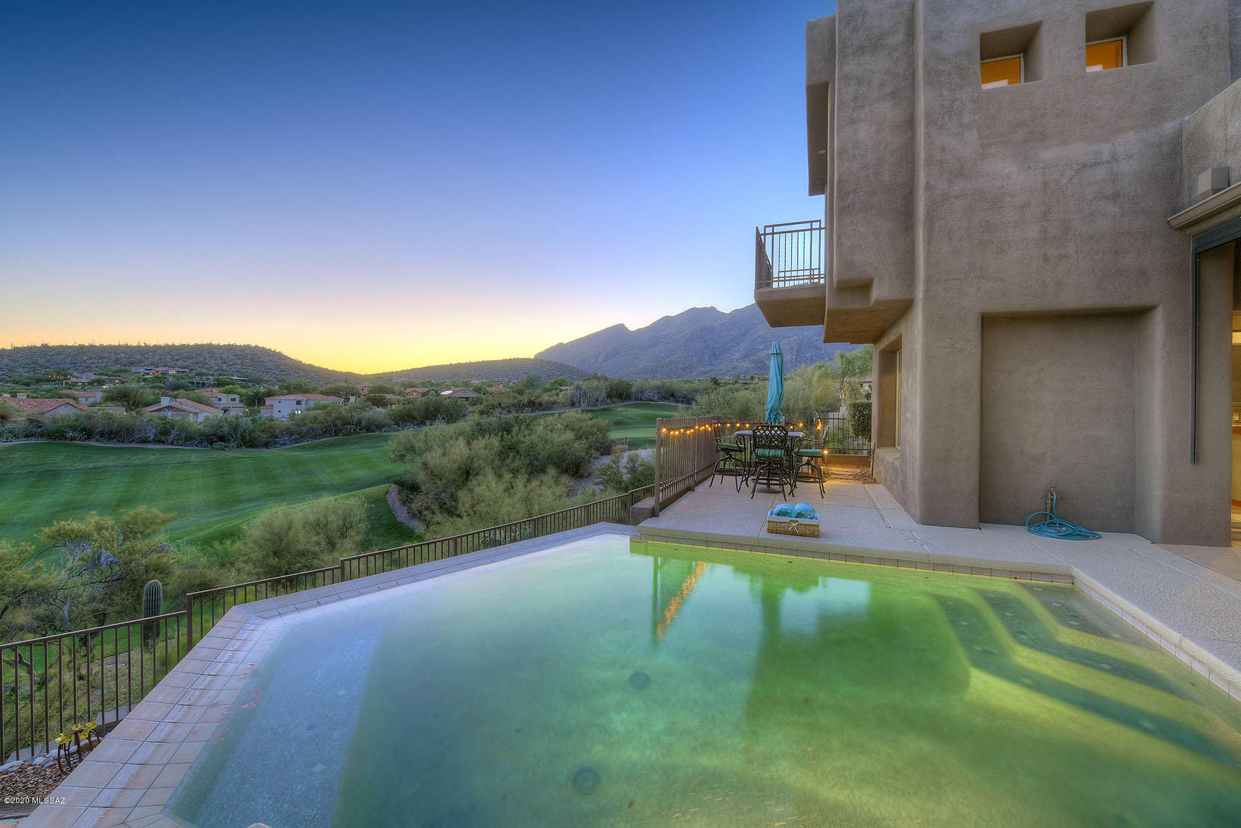 Commanding Golf Course,Mountain,& City Views From This Quality,Masonry Built,3 BR & 3 BA(2,852 SqFt) Home w/1 BR & 1 BA (327 SqFt) Casita.Located in The Ridge at Ventana Canyon(Gated),This Fine Home Features a Great Room w/Vaulted Ceilings,Walls of Windows,& Gas Fireplace,All Opening to Formal Dining Area & Adjacent Den/Office.The Newly Remodeled Island Kitchen Offers Mocha Cabinets,Granite, & Beautiful Glass Backsplash.New Wood Flooring on Staircase/Upstairs Leads to the Master Suite w/ Balcony & Master BA w/Soaking Tub,Separate Shower,Skylight,& Custom Built Walk-In closet.2 Guest Suites w/ Views,1 Guest BA,& a Laundry RM Complete the Upstairs.The Private Outdoor Living Space Features a Covered Patio,Built In Grill,Putting Green,& Stellar Negative Edge Pool w/Sweeping Golf & Sunset Views