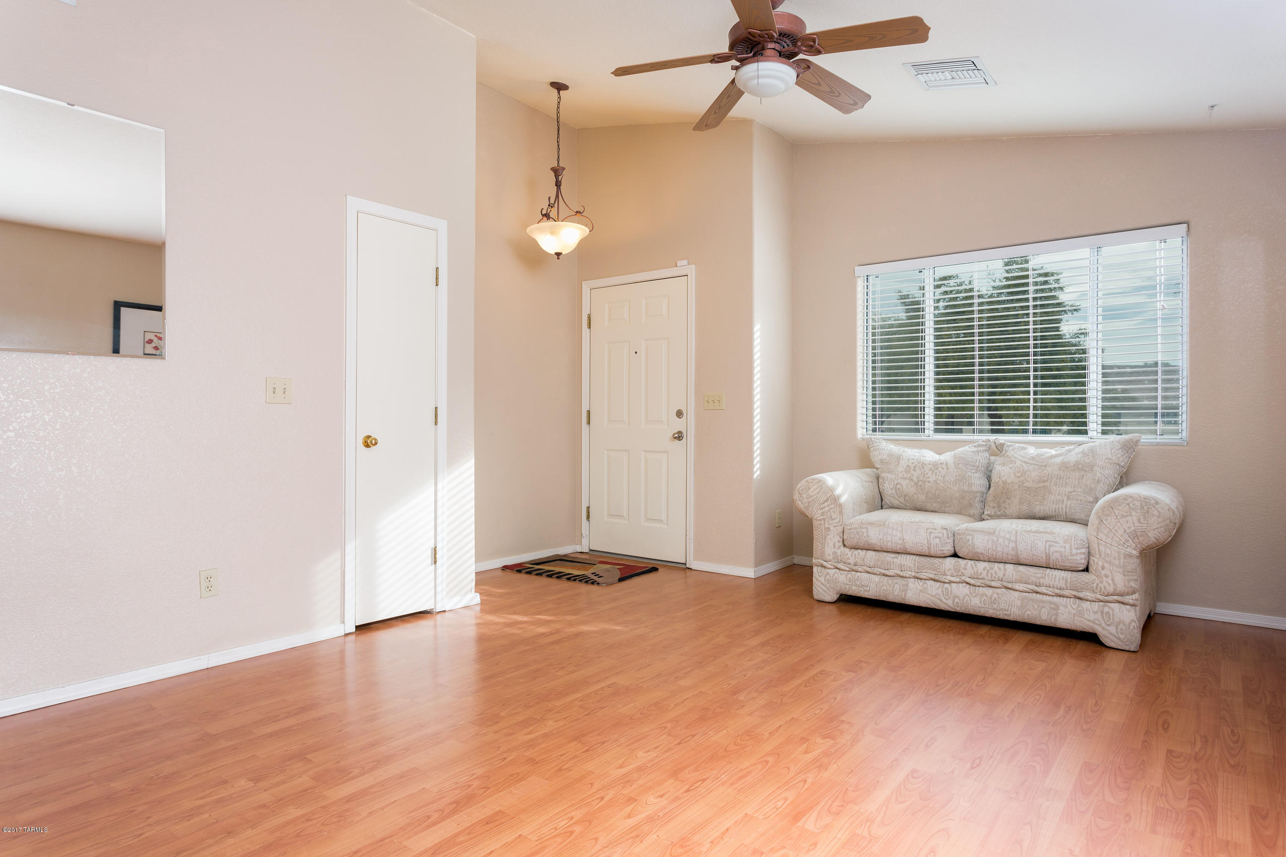 This lovely 4br/2ba home is move-in ready as it offers soaring ceilings, wood floors, an eat-in kitchen with breakfast bar and SS appliances, window coverings and upgraded lighting. The master suite is well appointed with a huge walk-in closet and en suite w/garden tub. Secondary bedrooms are all nice sized with large closets as well. The enormous backyard offers mountain views, a pool, spa, gazeebo and a basketball court! Call today to schedule your private showing!