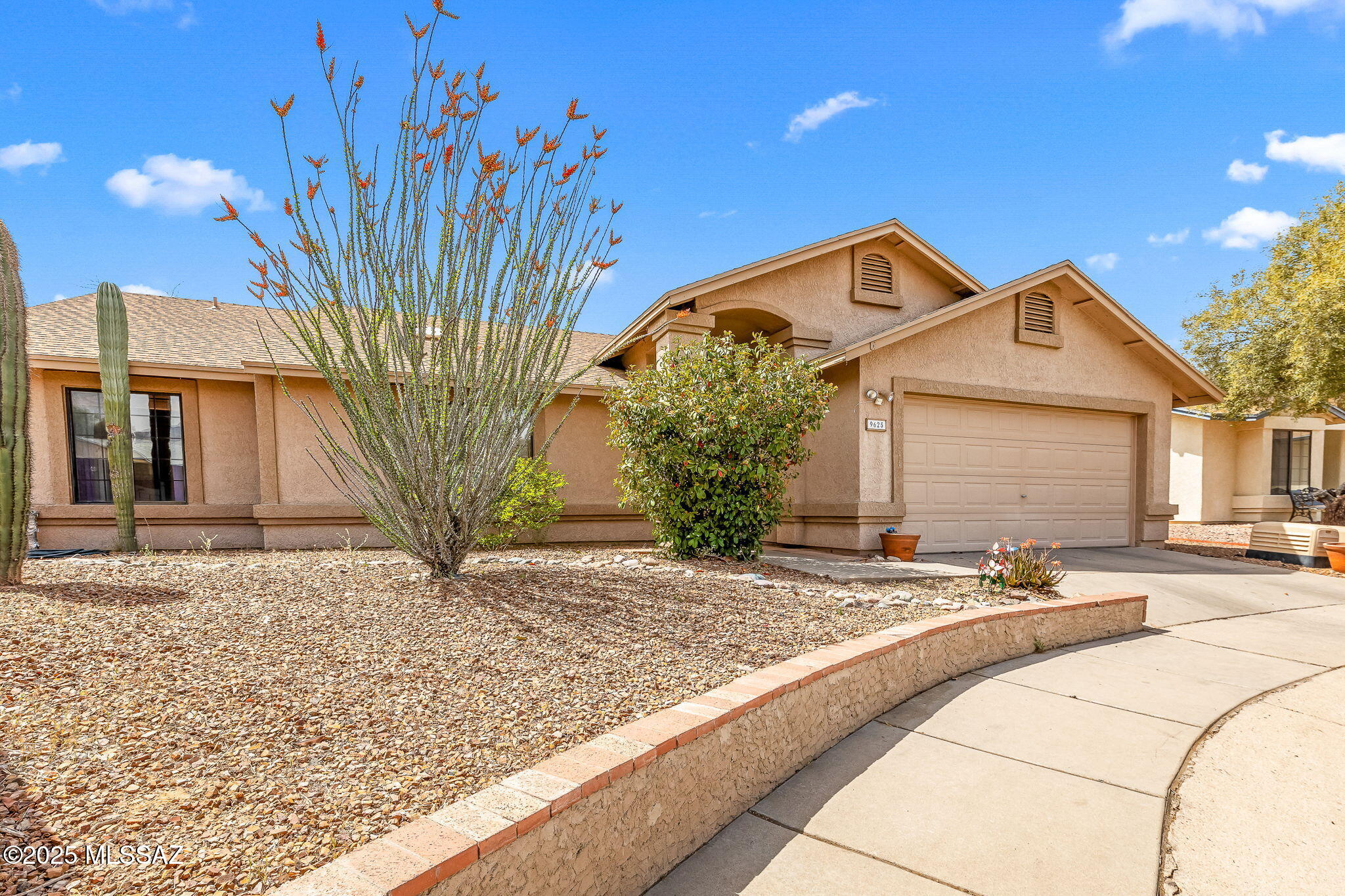 Gorgeous Open floorplan with soaring ceilings showcase this 3 Bedroom 2 Bath home, on large corner .19 acre lot. Beautiful Mountain & Sunset Views & NO HOA! No home to the East (Large County owned area, .80 acres), or rear. Split Bedroom plan w/soaking tub in primary suite so you can slip into the bath & unwind at the end of the day. Large walk in closet. NO Carpet. Custom desert related imprints on Saltillo tile in each room. Kitchen features spacious breakfast bar. Extended patio opens to extra large yard w/desirable outdoor living space. Backyard features Turf, Water Fountain, Ramada, Large Shed, Separate dog area, & Lemon, Pomegranate, & Queen Palm Trees. Close to shopping, restaurants, & entertainment.